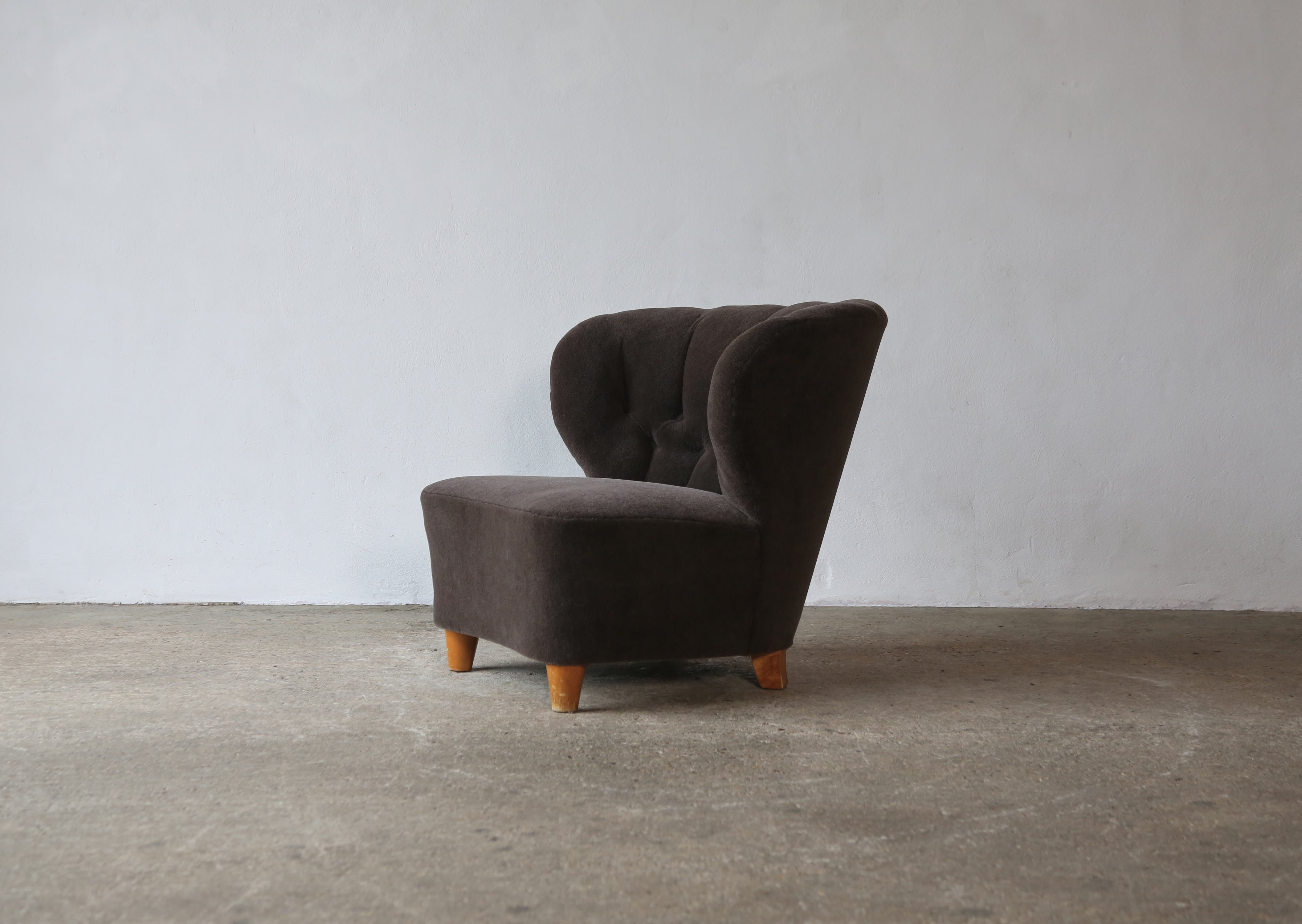 Gösta Jonsson attributed lounge chair, 1950s, Sweden, newly upholstered in a premium, pure Alpaca wool fabric. Fast shipping worldwide.



