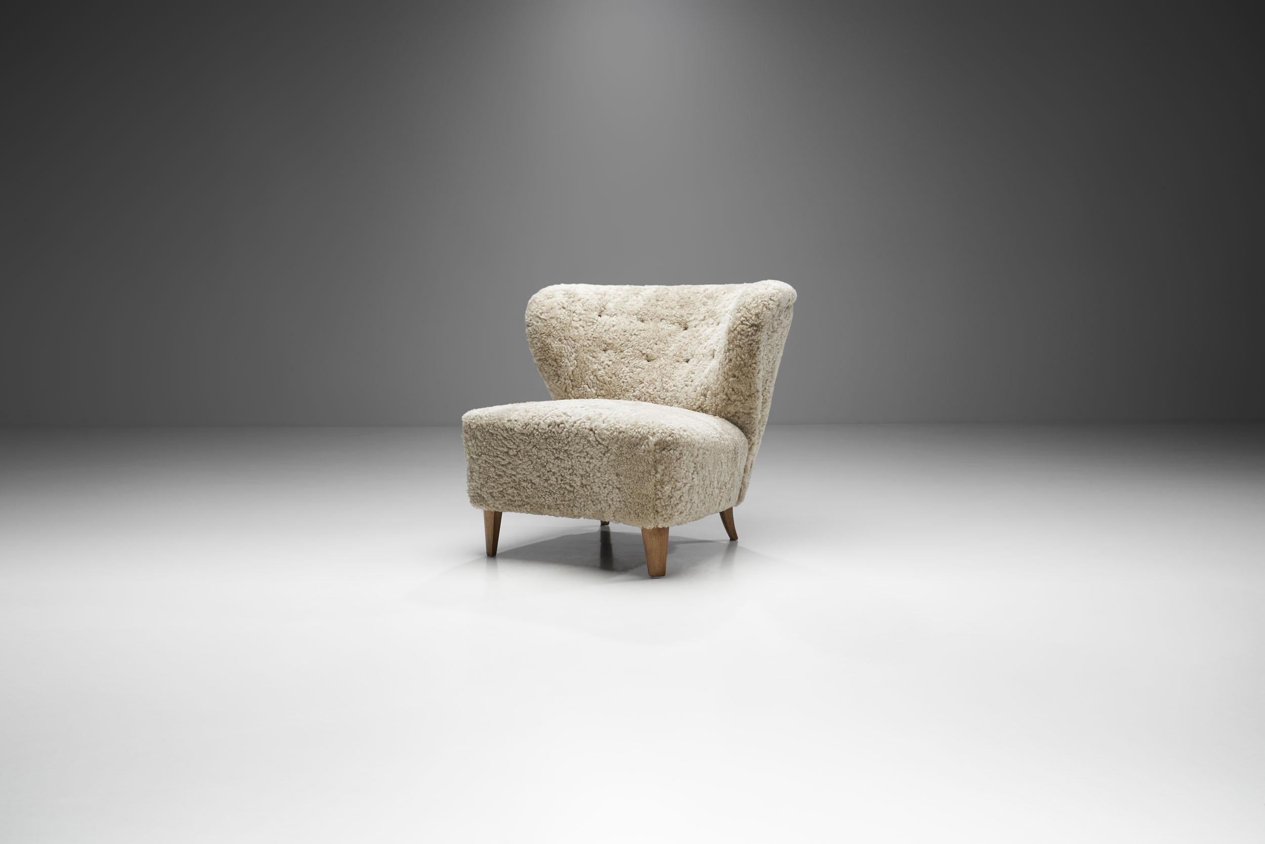 This lounge chair by Swedish designer, Gösta Jonsson, exudes quality and personality from all angles, and is the designer’s most famous model. The basic Swedish design principles are all present and upholstered in soft and stylish sheepskin.

With