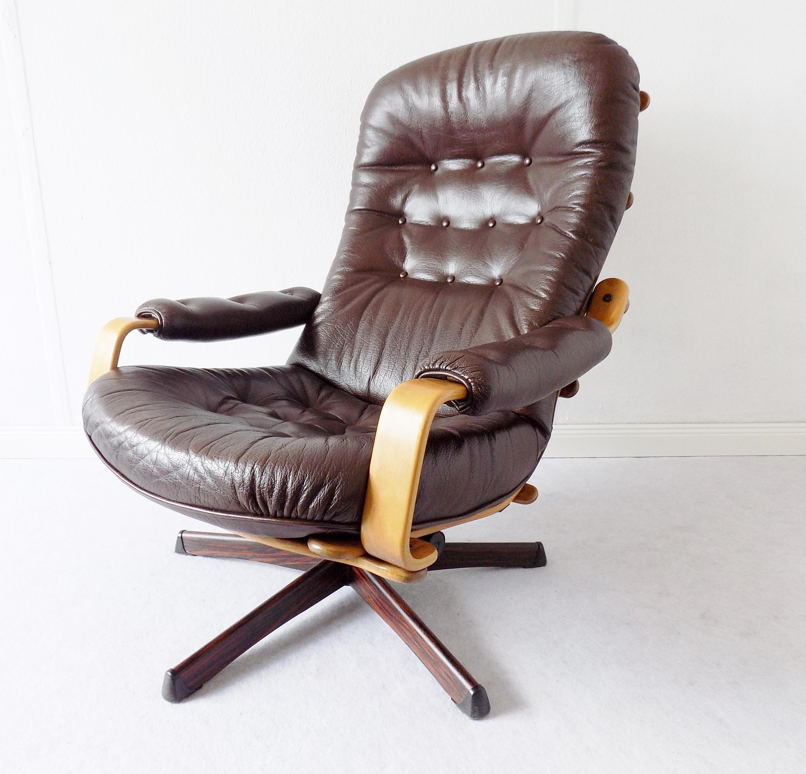 Göte Möbler Lounge Chair , Swedish Design, Mid-Century modern, Swivel, Leather

This Göte Möbler lounge chair, made from brown leather and a very nice looking wooden frame, is in very good condition. Rosewood effect on the base, leather, wood in