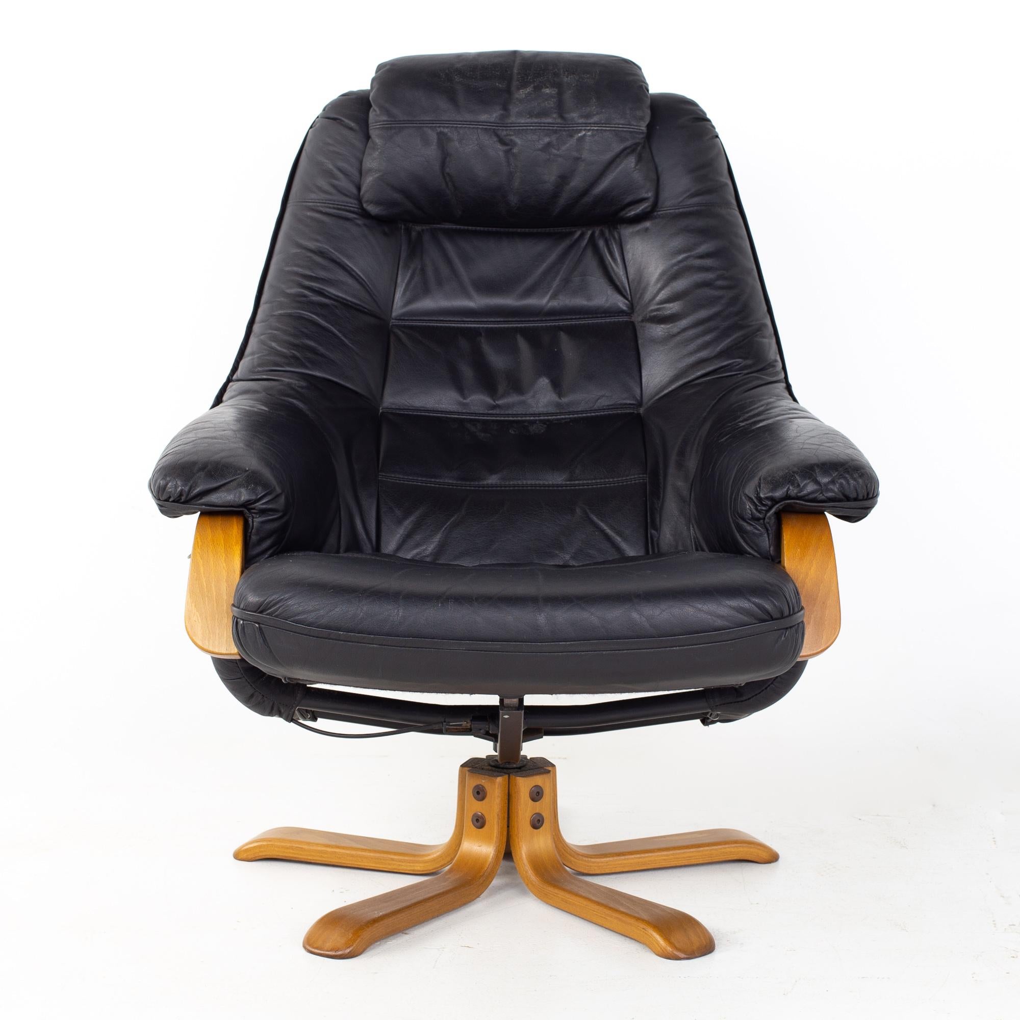Gote Mobler Mid Century Swedish Black Leather Swivel Lounge Chair and Ottoman In Good Condition In Countryside, IL