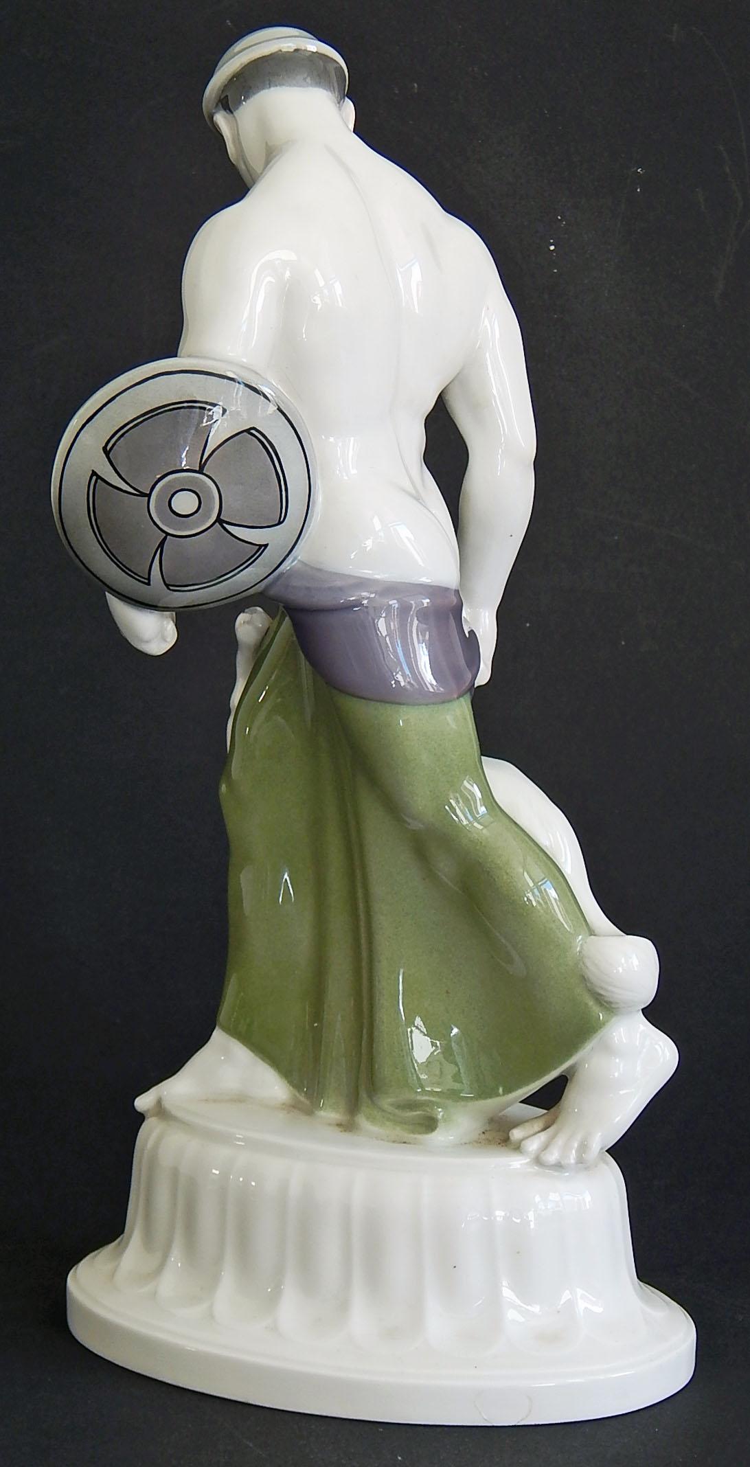 An extraordinary, rare and historic porcelain sculpture, this depiction of a half-nude Goth with a greyhound by his side was sculpted by Adolf (or Adolph) Amberg for KPM in 1905, to celebrate the wedding of Prussian Crown Prince Wilhelm to Duchess