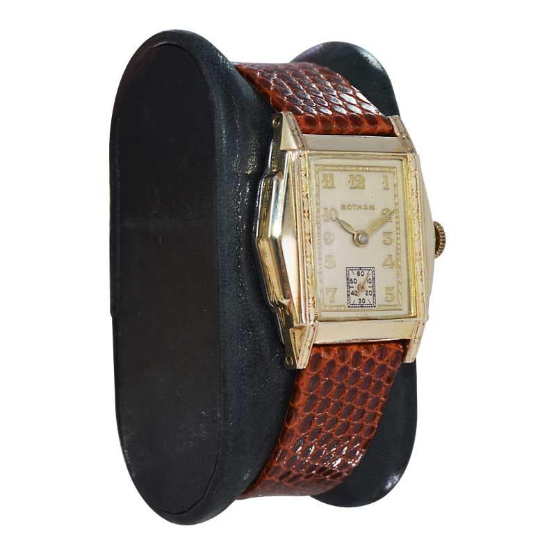 FACTORY / HOUSE: Gotham Watch Co.
STYLE / REFERENCE: Art Deco
METAL / MATERIAL: Yellow Gold Filled 
CIRCA / YEAR: 1940's
DIMENSIONS / SIZE: 34mm X 28mm
MOVEMENT / CALIBER: Manual Winding / 7 Jewels 
DIAL / HANDS: Original Silvered Patinated with
