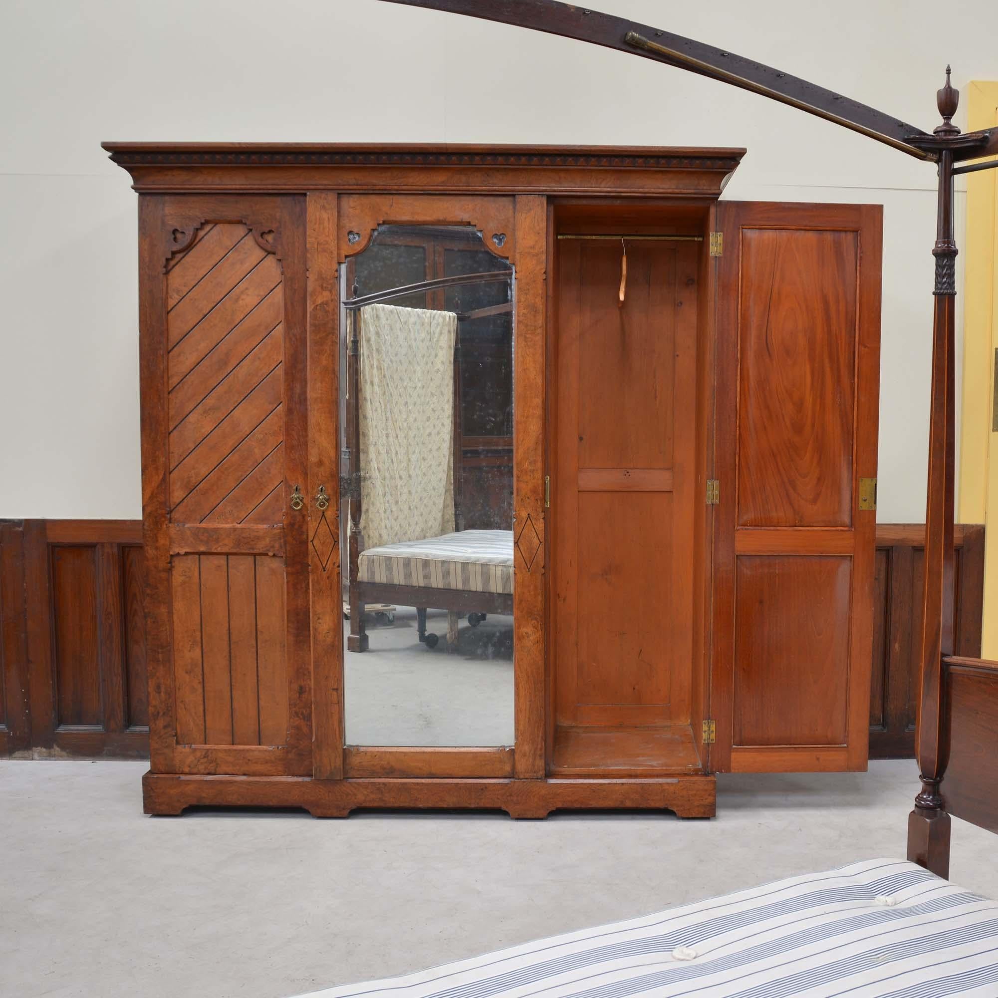 19th Century Gothic antique brown oak wardrobe by Marsh, Jones & Cribb For Sale