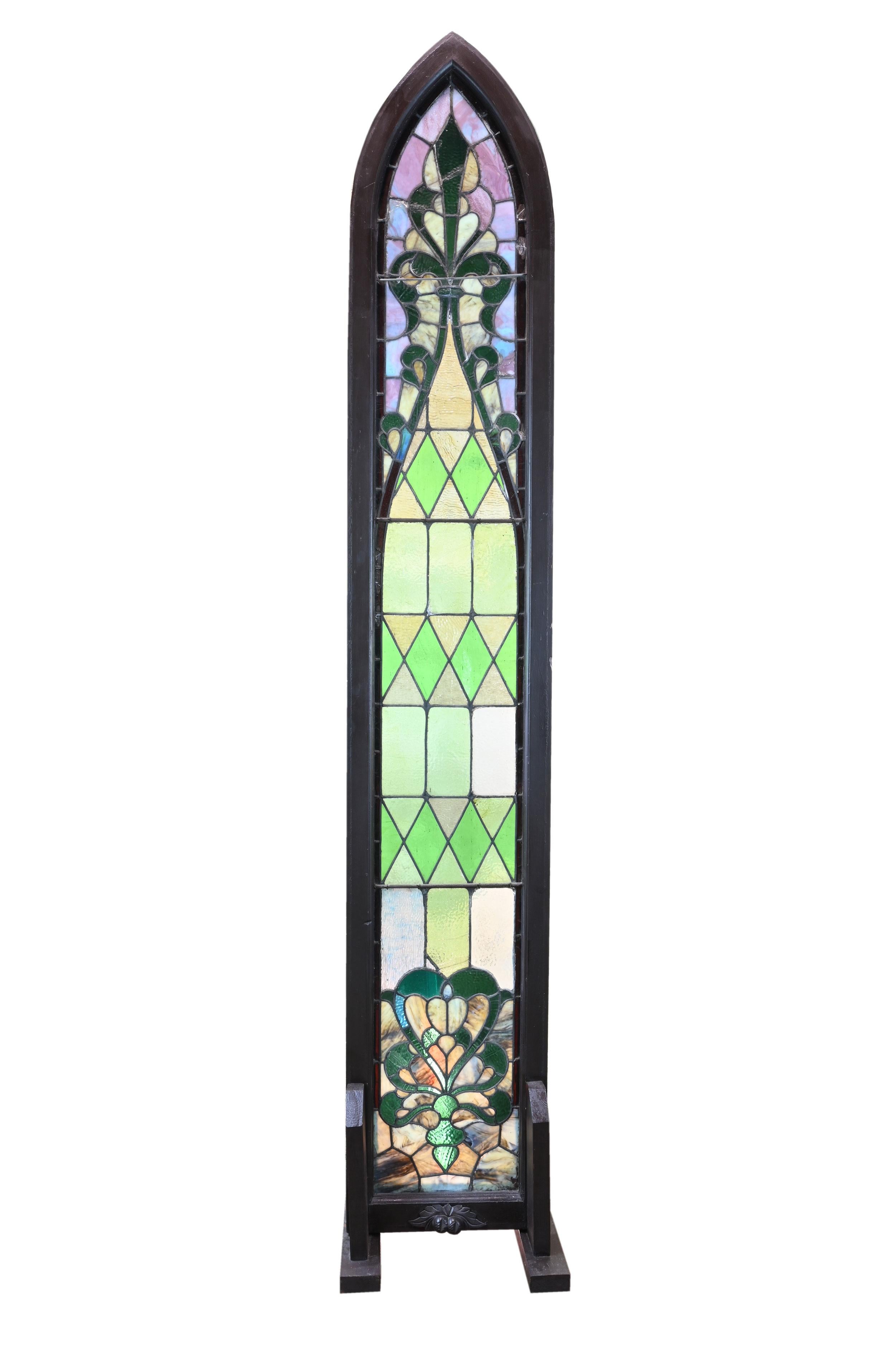 AA# 49950
 Circa: 1900
 Condition: Age consistent / good
 Material: Wood frame, slag and stained glass
 Finish: Frame painted along with feet to match
 Country of Origin: U.S.A.
 Dimensions: 17 7/8” wide x 2 1/8” thick frame x 104” height
