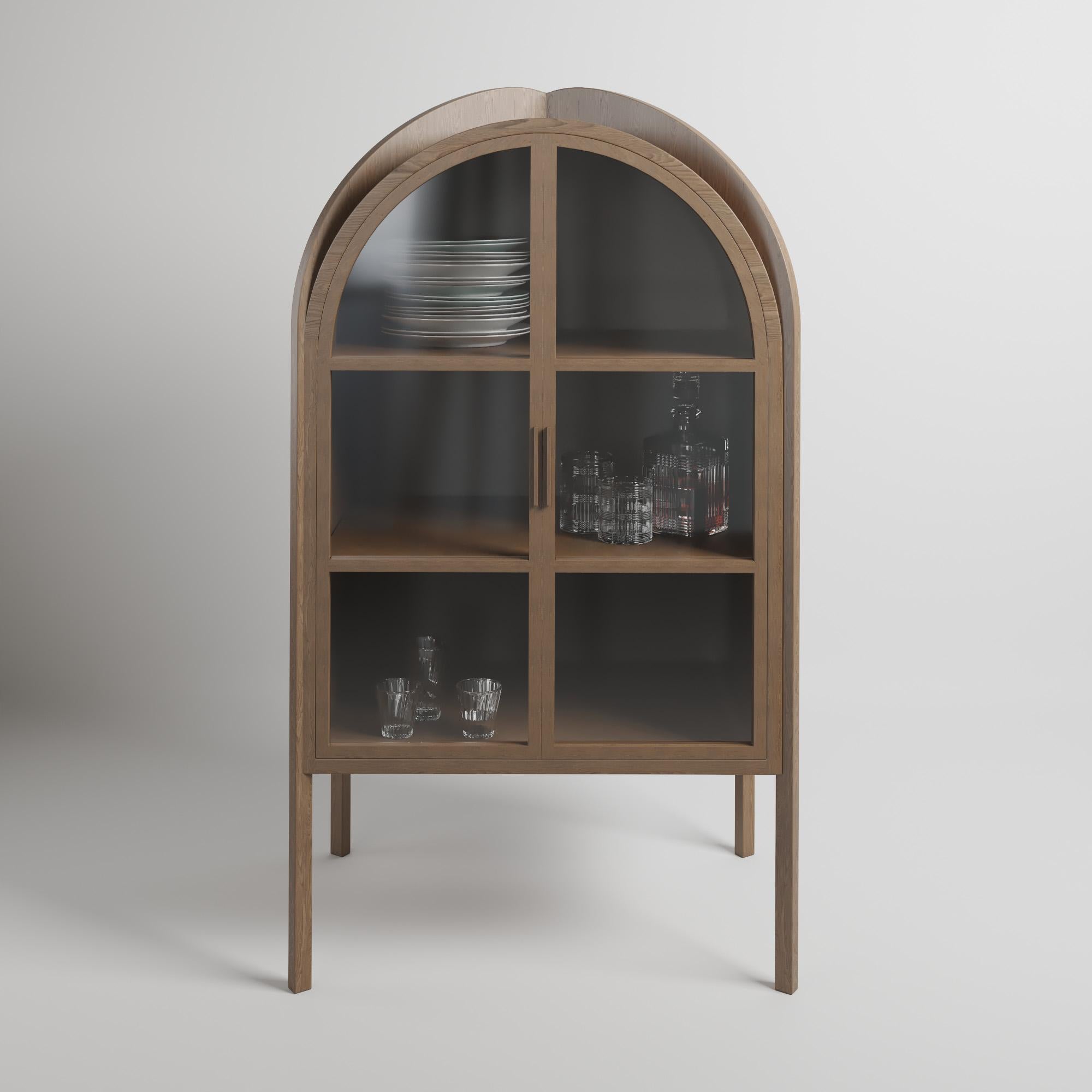 The Gothic Armoire reimagines early Gothic architecture for contemporary living. This exquisite armoire blends the grandeur of history with modern functionality, featuring sensuous, soft curves that subtly evoke the Romanesque style. The apex is