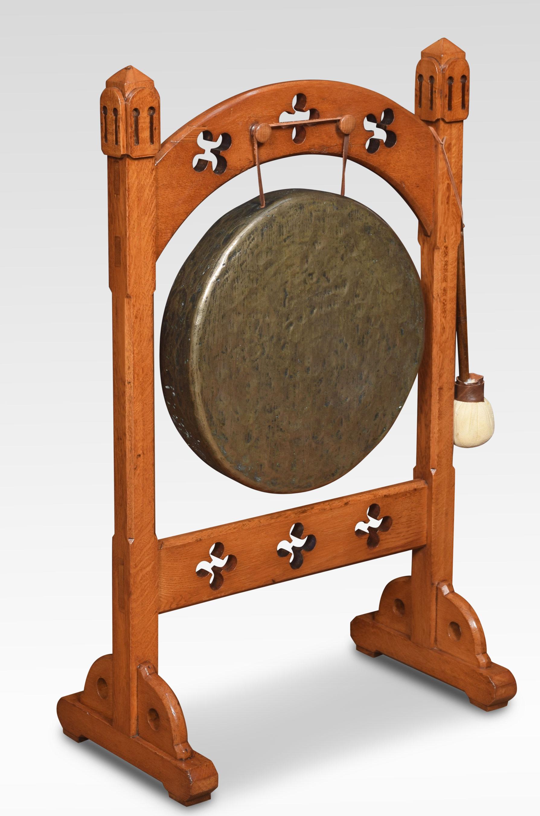 19th century gothic dinner gong the oak frame carved with Gothic trefoil motifs supporting the circular brass gong. Together with beater.
Dimensions:
Height 37.5 inches
Width 23.5 inches
Depth 13 inches.