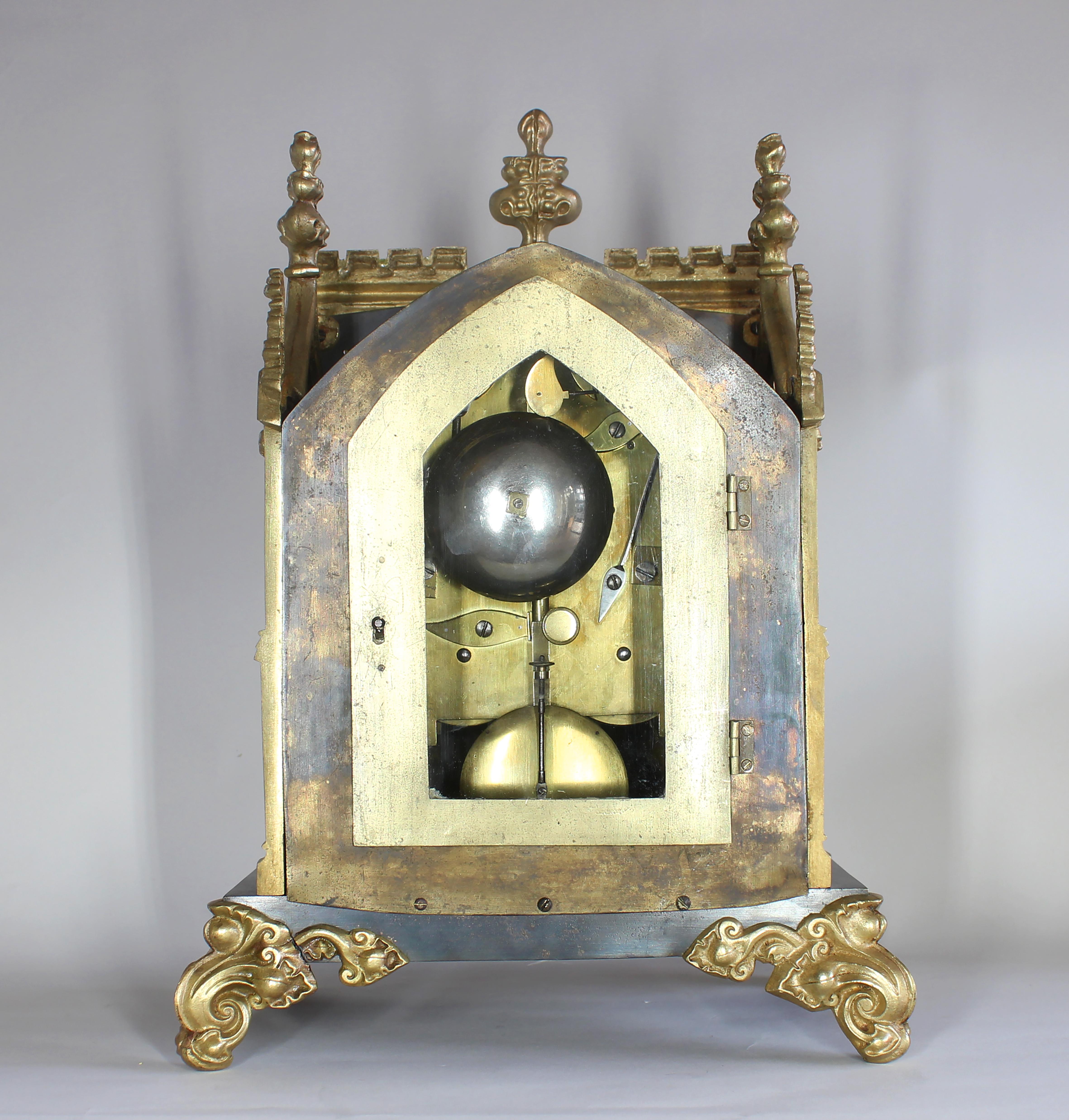 Cast Gothic Bronze and Brass Mantel Clock For Sale