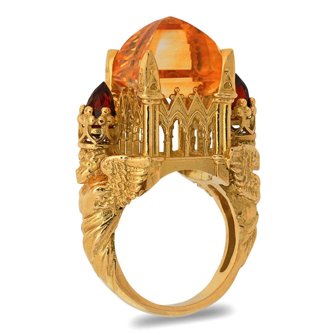 This passionate ring is a truly wondrous one of a kind piece.

Handcrafted in 18kt yellow gold this glorious ring features a central 14.6mm x 14.6mm radiant citrine of 17.25 carats atop a signature William Llewellyn Griffiths cathedral setting. The