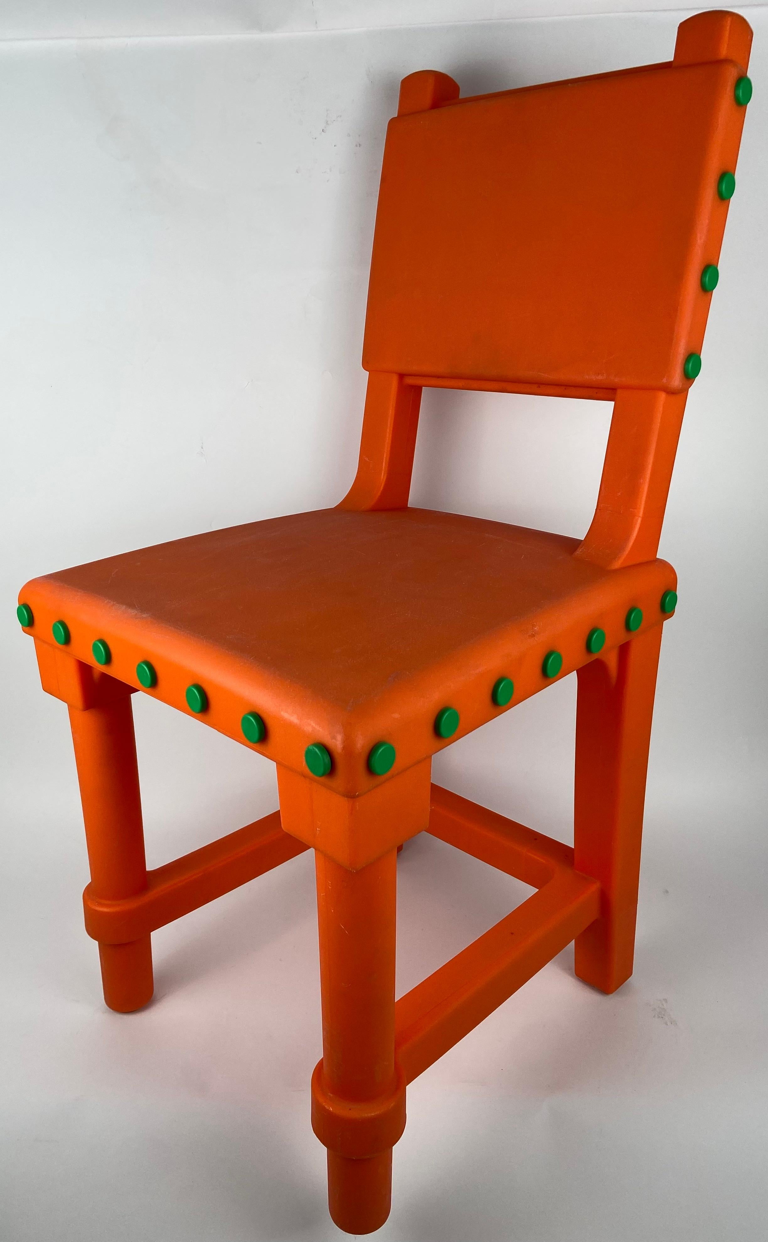 Gothic chair by Moooi in orange. Designer: Studio Job. Circa 2012