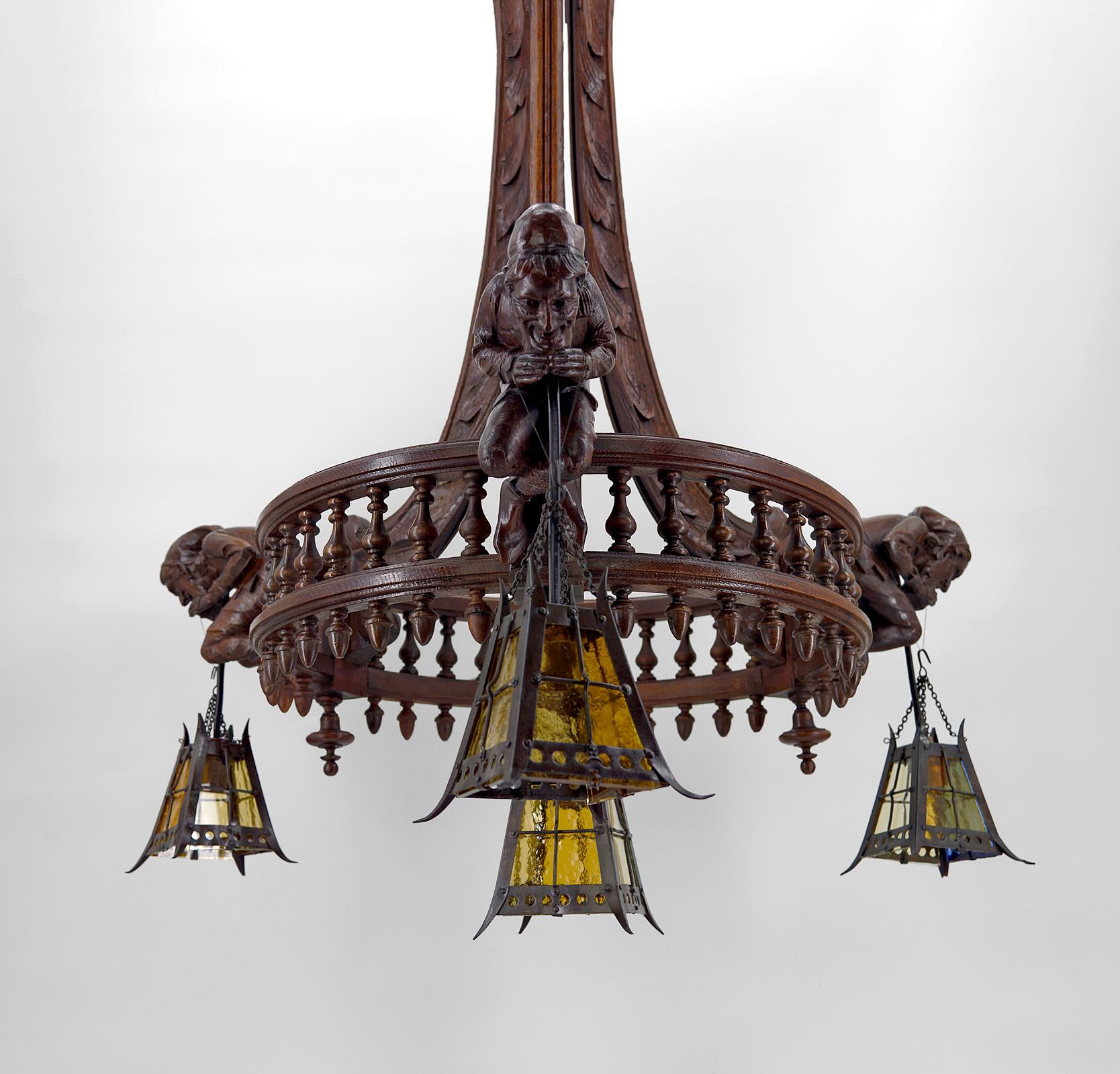 French Gothic Chandelier Carved with Jesters and Lanterns, France, circa 1900 For Sale
