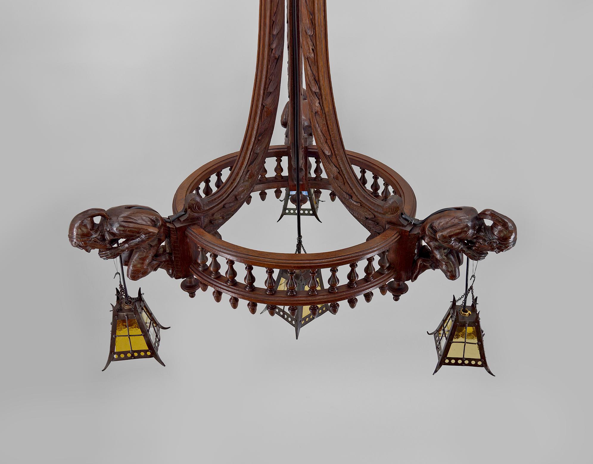 Early 20th Century Gothic Chandelier Carved with Jesters and Lanterns, France, circa 1900 For Sale