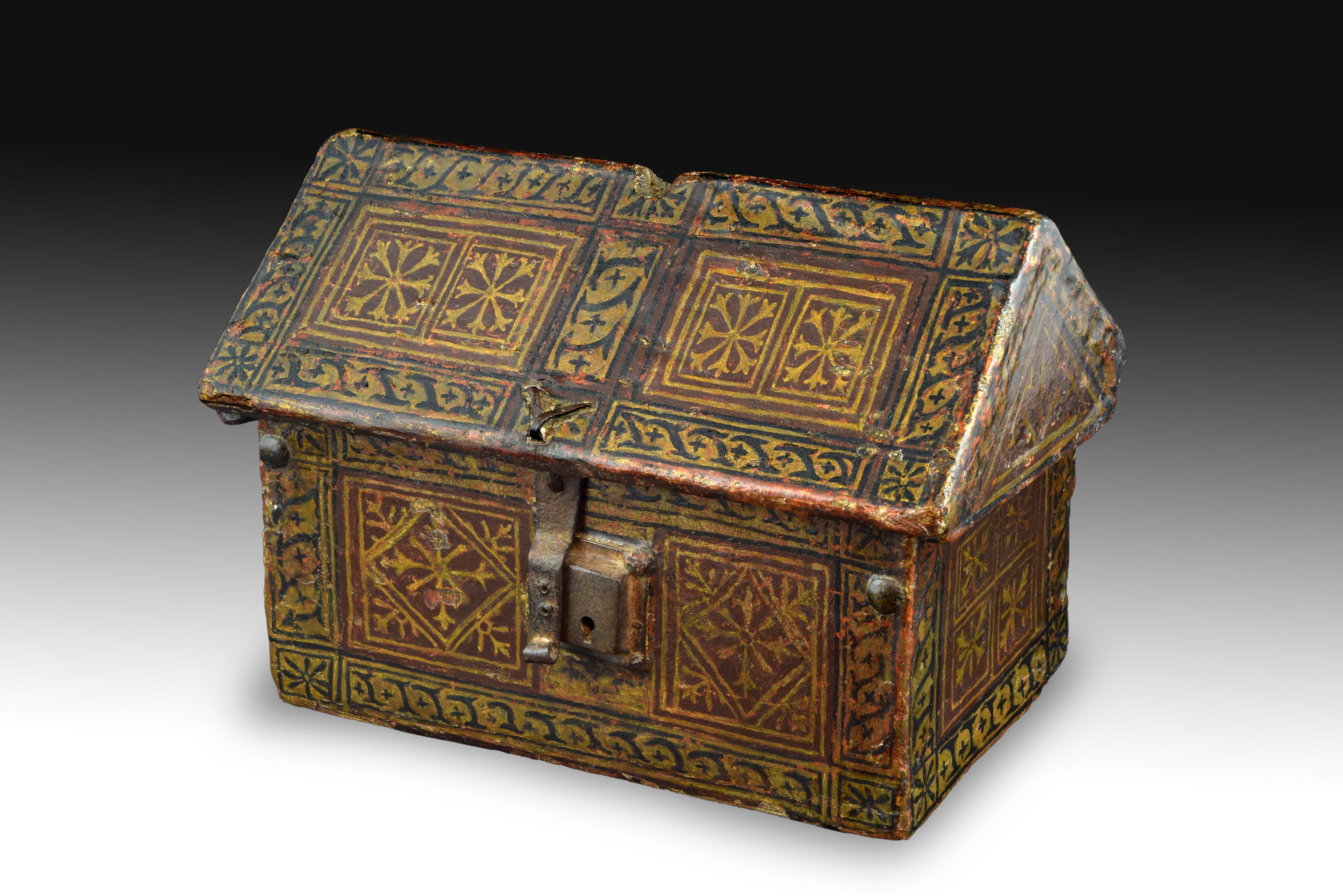 Gothic chest, Spain, late 15th century.
Polychromed wood.
Spanish chest of the late Gothic made in wood with built-in integral boards. It has a prismatic structure and a double top cap, and appears entirely decorated with polychrome motifs, covering