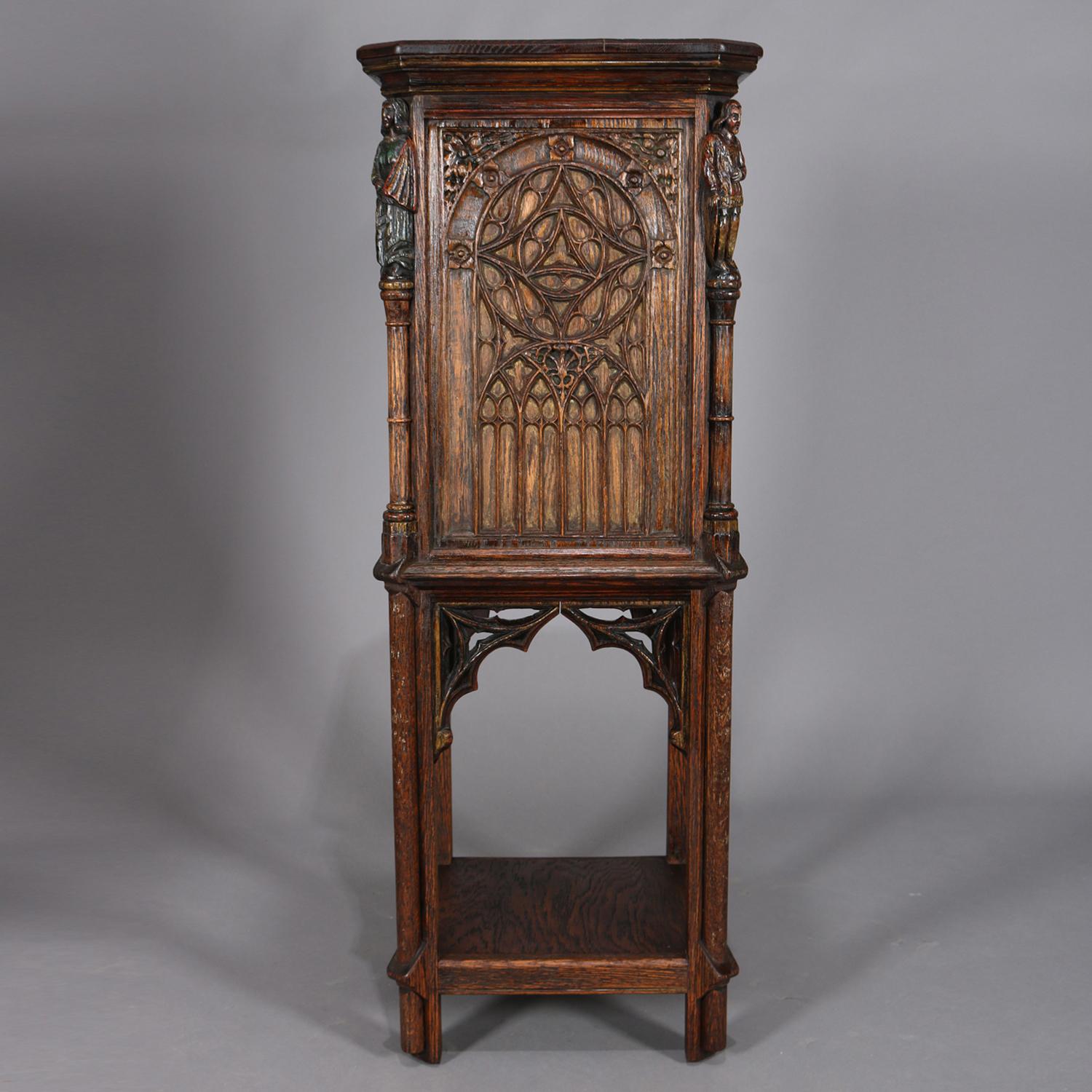 English Gothic Figural Carved Oak Polychromed and Gilt Cellarette Cabinet, circa 1880