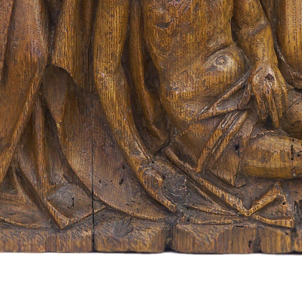 Oak fragment of a Gothic altarpiece with the representation: the Lamentation of Christ?.
A regular part in the cycle of the life of Christ where his death is wept by Mary and others.
The altarpiece is in the front marked with the 
