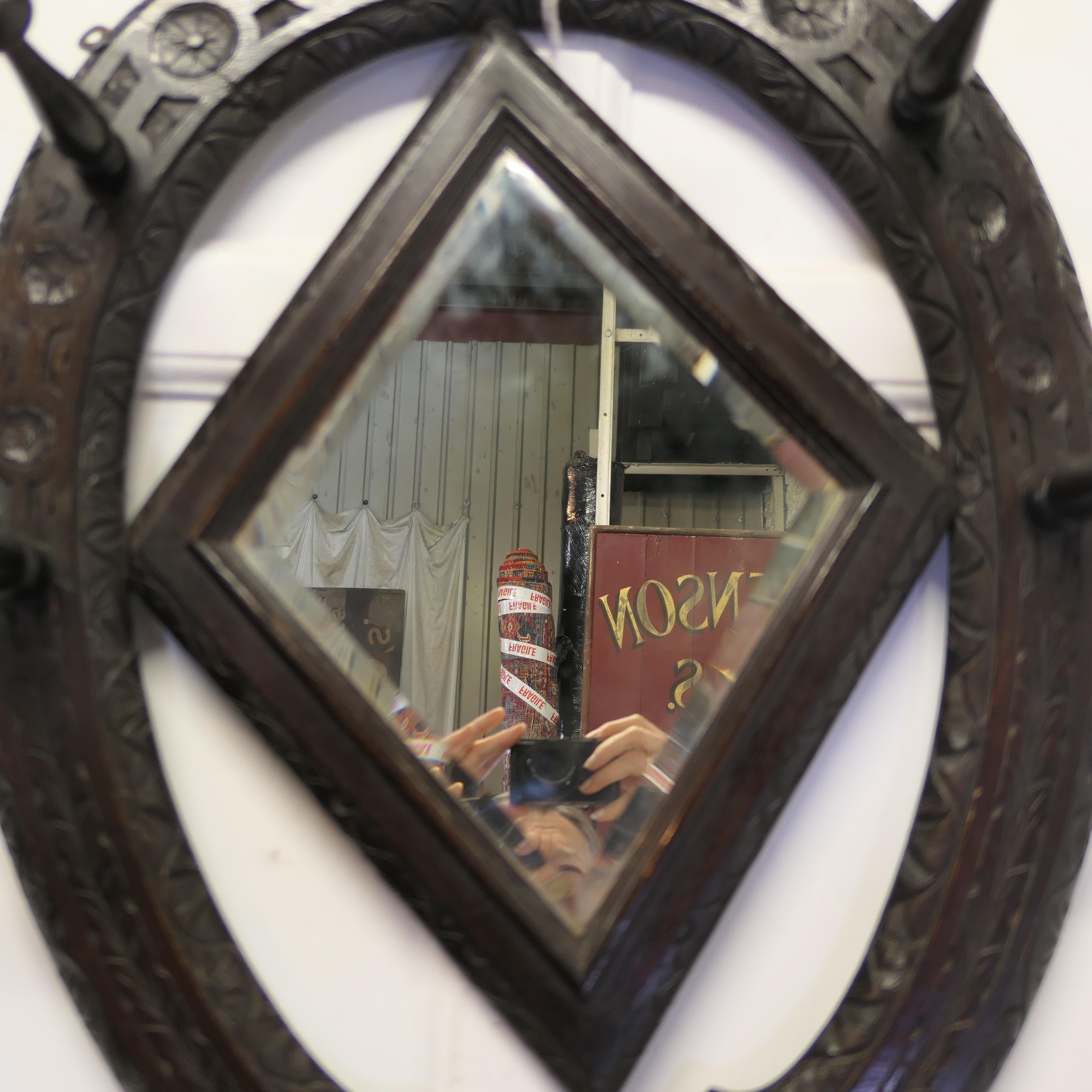 19th Century Gothic Horseshoe Coat and Tack Rack with Mirror   A very fine quality piece   For Sale