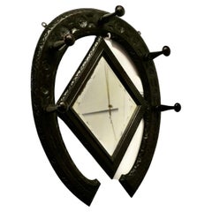 Used Gothic Horseshoe Coat and Tack Rack with Mirror   A very fine quality piece  