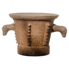 Mortero gótico de hierro