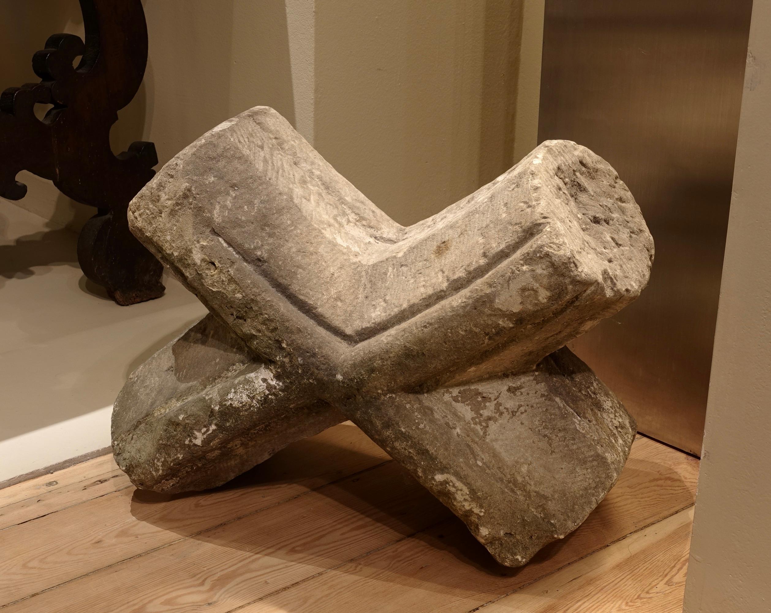 Gothic Keystone
Limestone
France, 14th century
33 x 47 x 26 cm

A striking relic of Gothic architecture, this keystone captivates with the purity and power of its intersecting forms. Once crowning a vaulted ceiling, it now stands as a sculptural