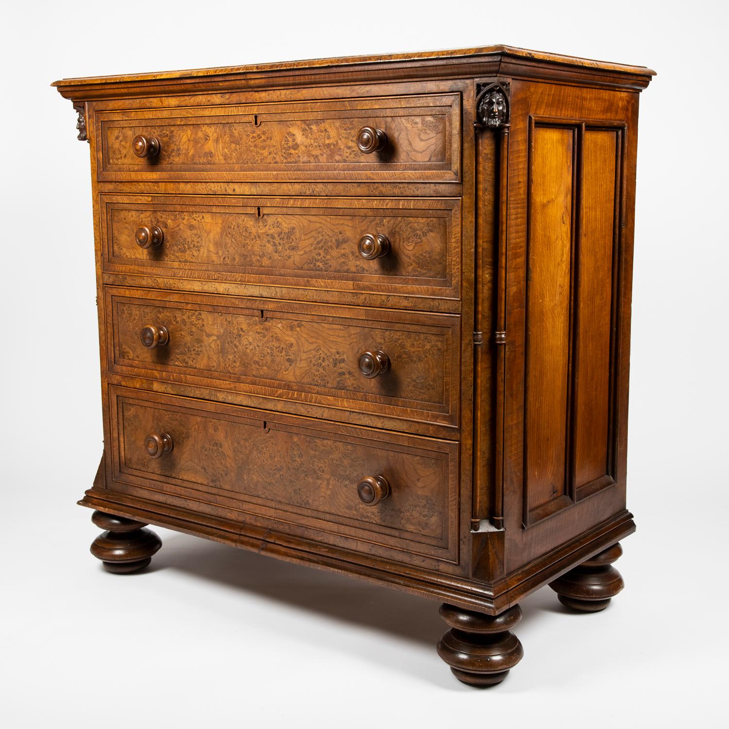 Gothic oak chest of drawers decorated with carved masks and columns For Sale 6