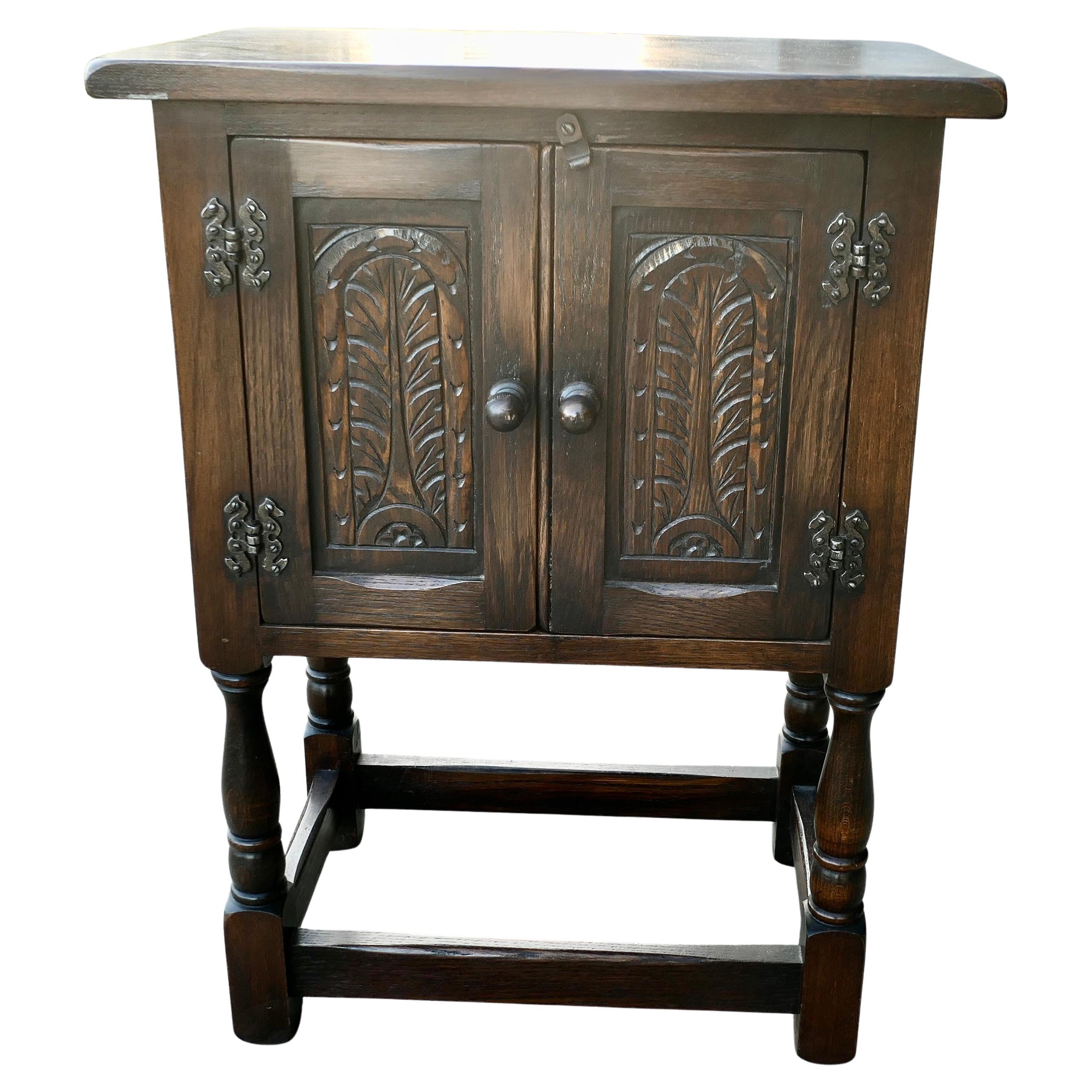Gothic Oak Cupboard by Bevan Funnel Ltd  A Charming little piece dating