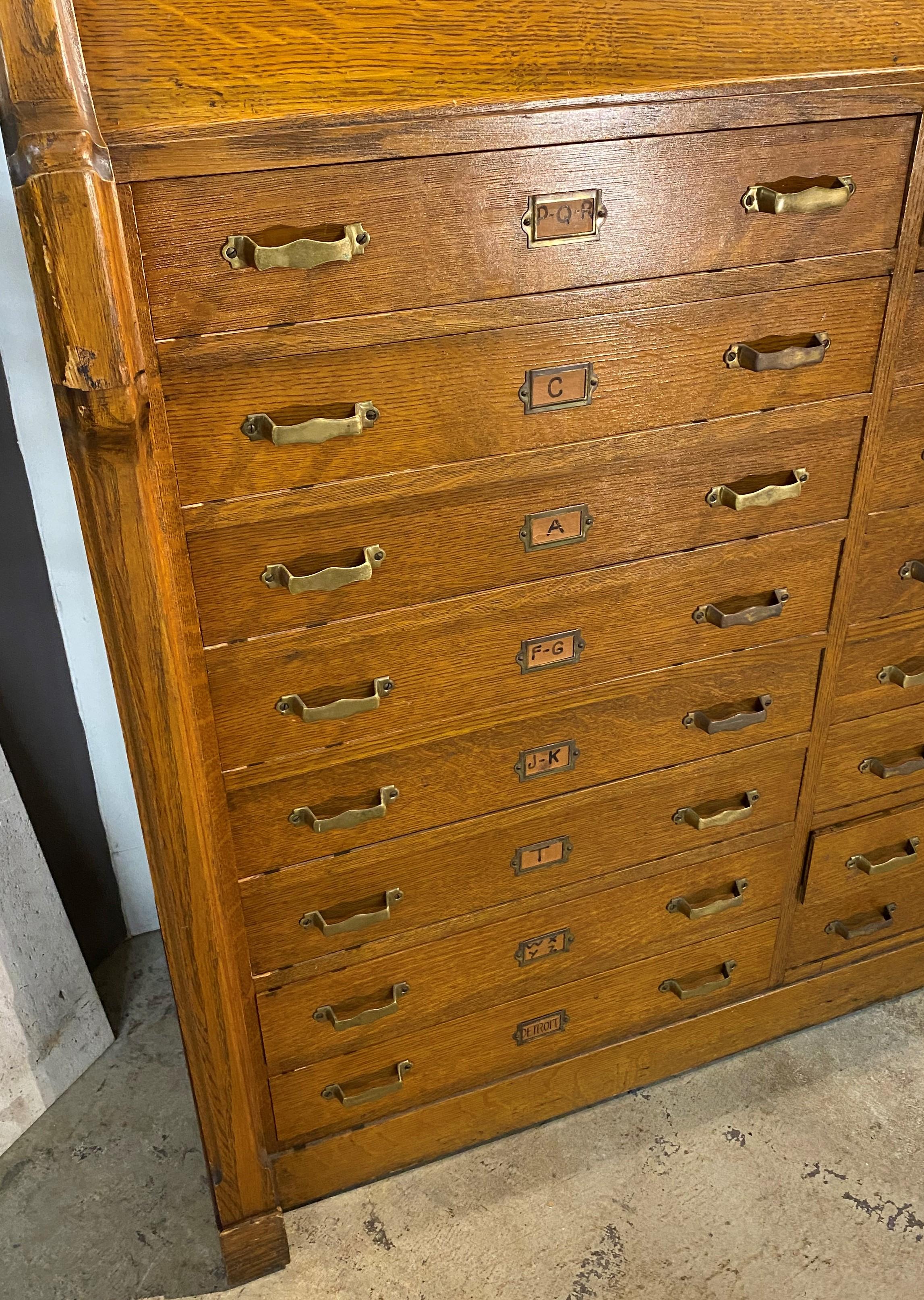 American Gothic Oak Library or Book Display Stand with 16 Drawers circa 1920’s