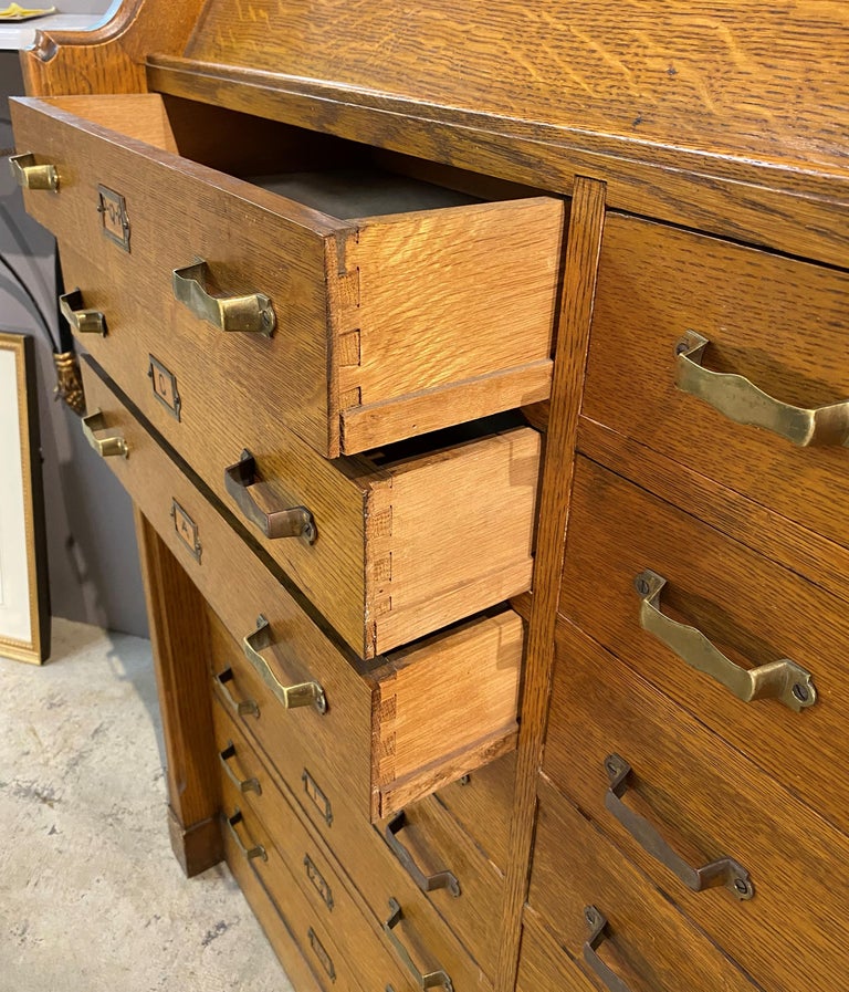 Gothic Oak Library or Book Display Stand with 16 Drawers circa 1920’s