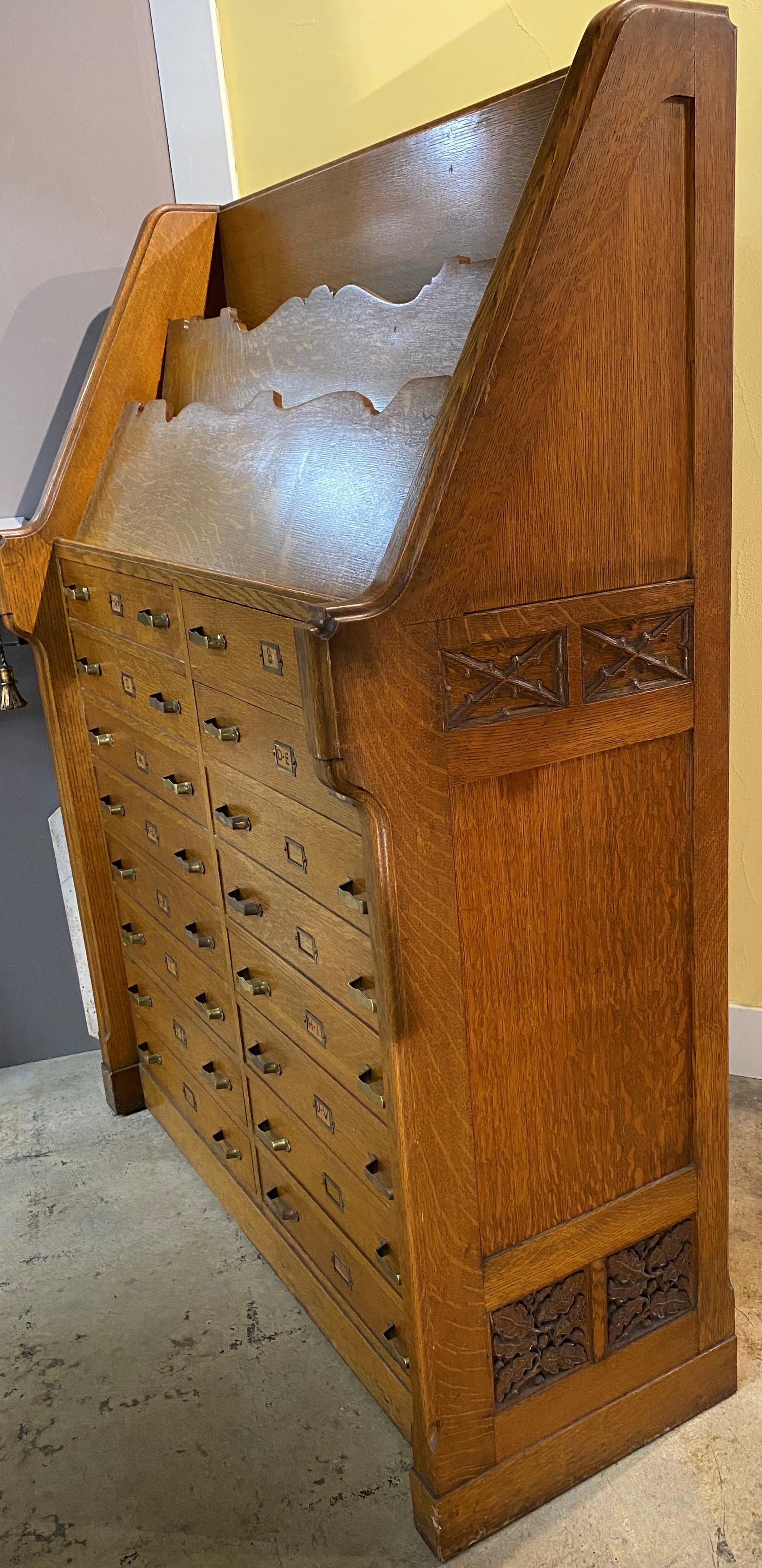 Early 20th Century Gothic Oak Library or Book Display Stand with 16 Drawers circa 1920’s