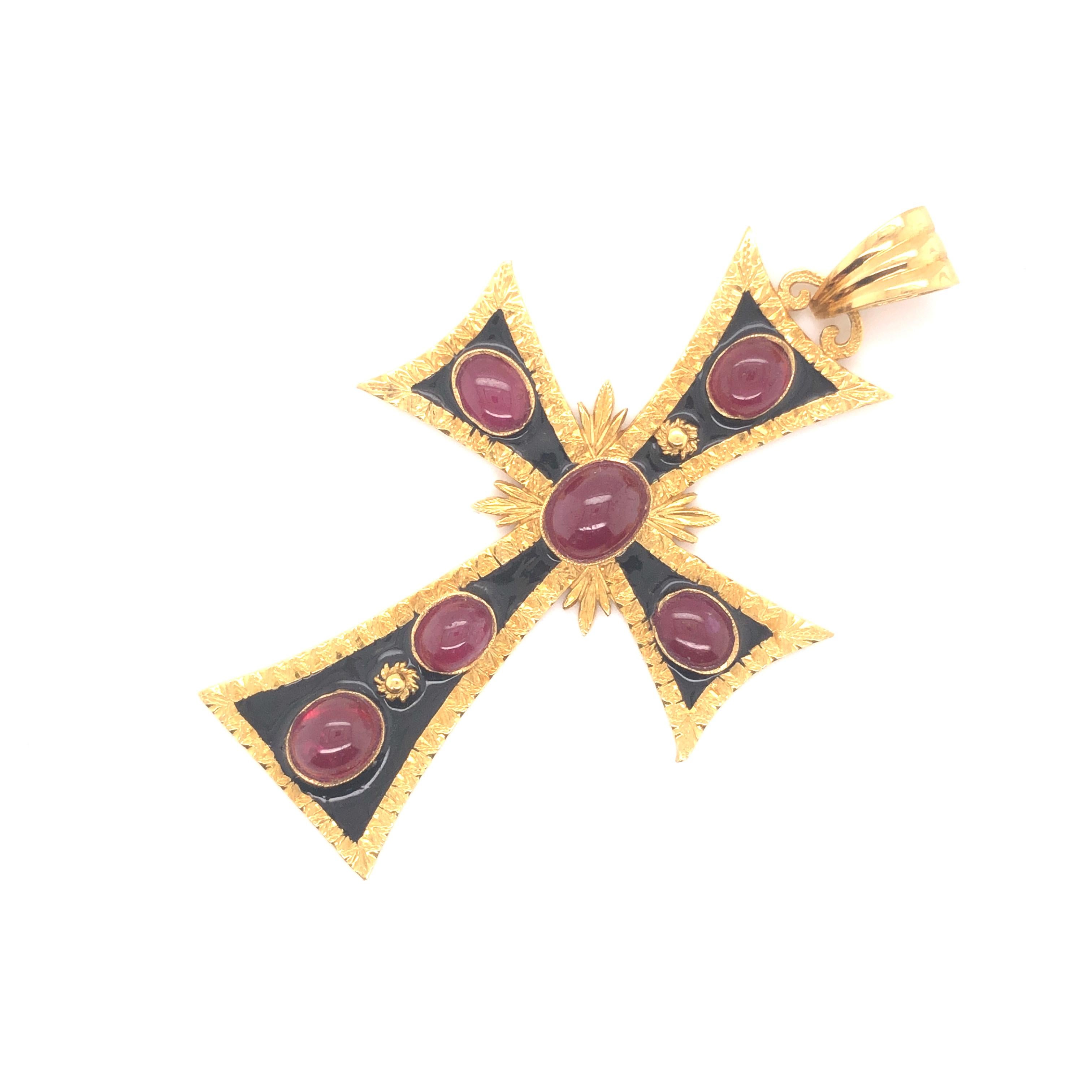 Large one of a kind cross pendant crafted in 18k yellow gold. This beautiful design shows detail throughout. The focal point of the pendant are five bezel set cabochon rubies showing a rich red color. The pendant has etching throughout the design