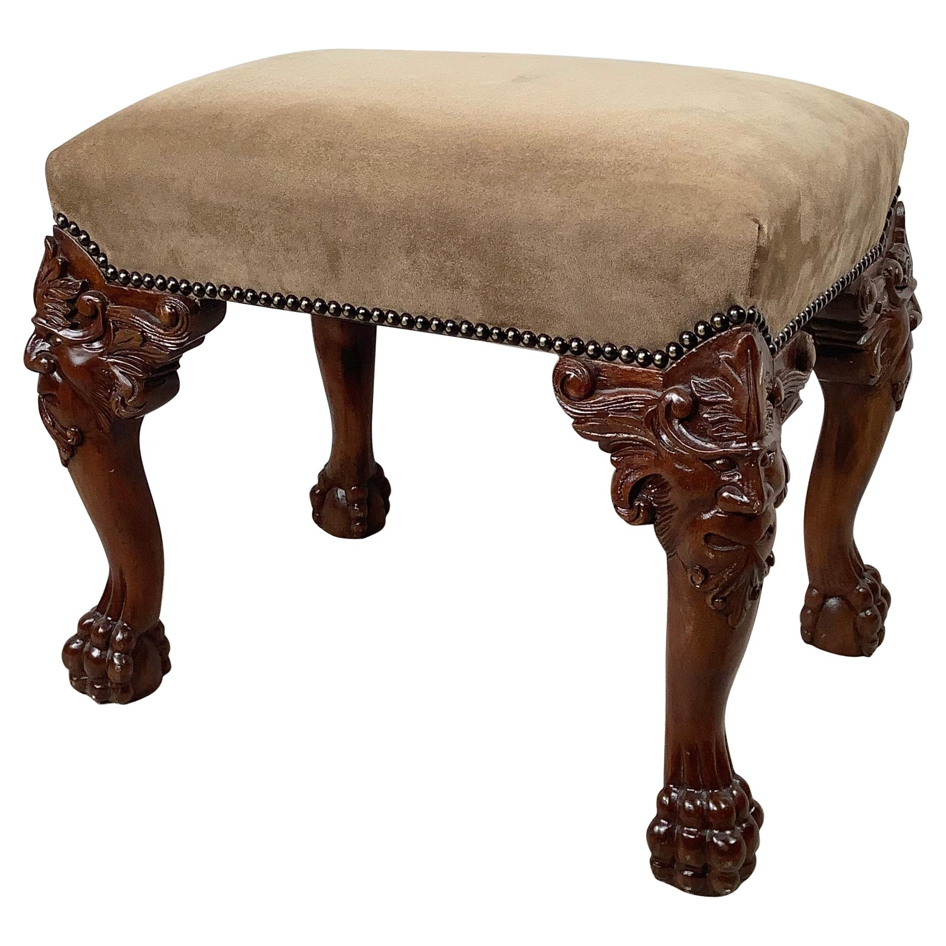 Gothic Revival Carved Footstool with Grotesque Masks and Ball-and-Claw Feet For Sale