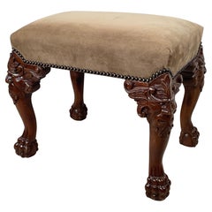 Gothic Revival Carved Footstool with Grotesque Masks and Ball-and-Claw Feet Gothic Revival Carved Footstool with Grotesque Masks and Ball-and-Claw Feet