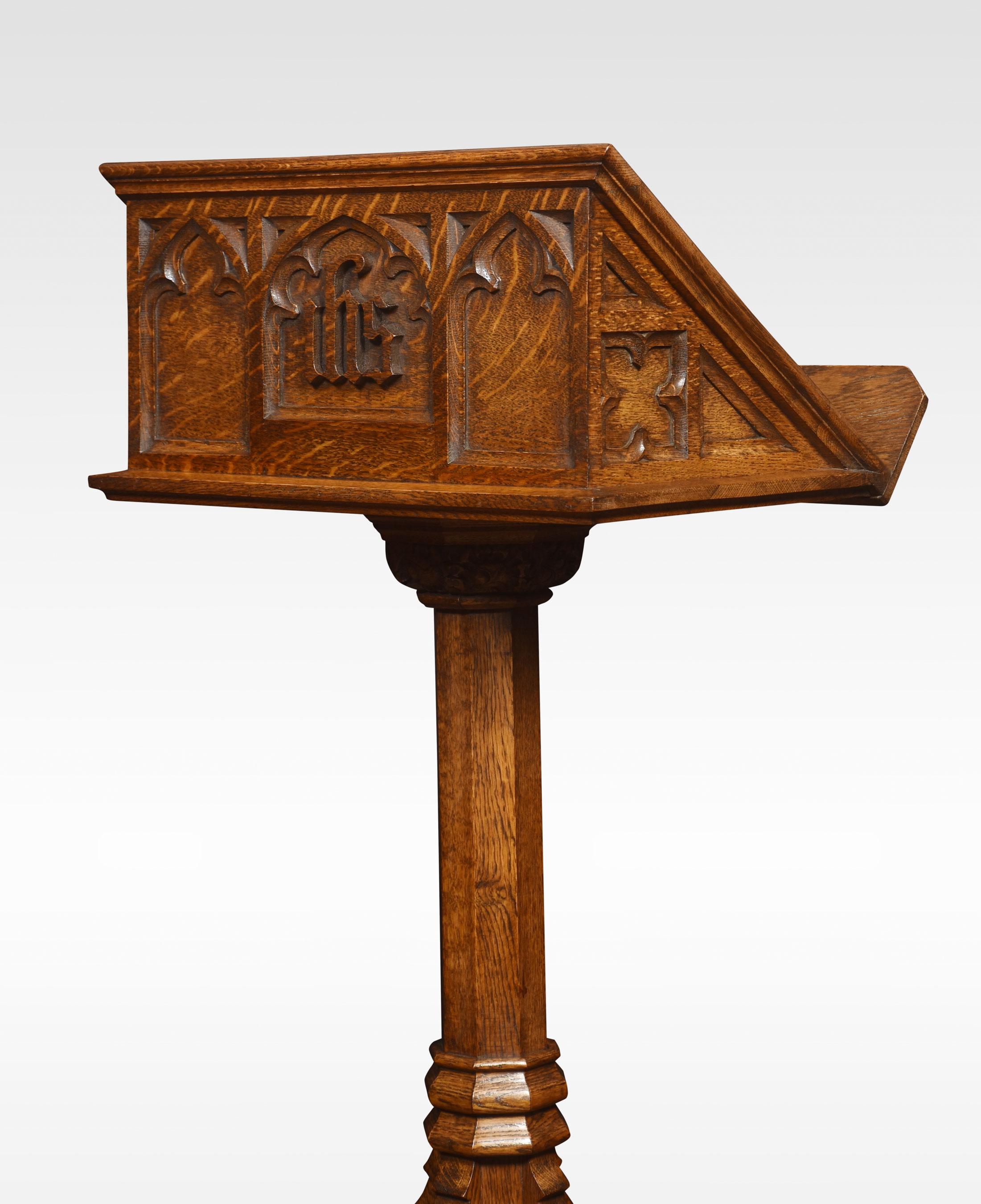 Oak lectern the Gothic carved bookrest, raised up on an octagonal carved column and stepped square base.
Dimensions
Height 54 Inches
Width 18 Inches
Depth 17.5 Inches.