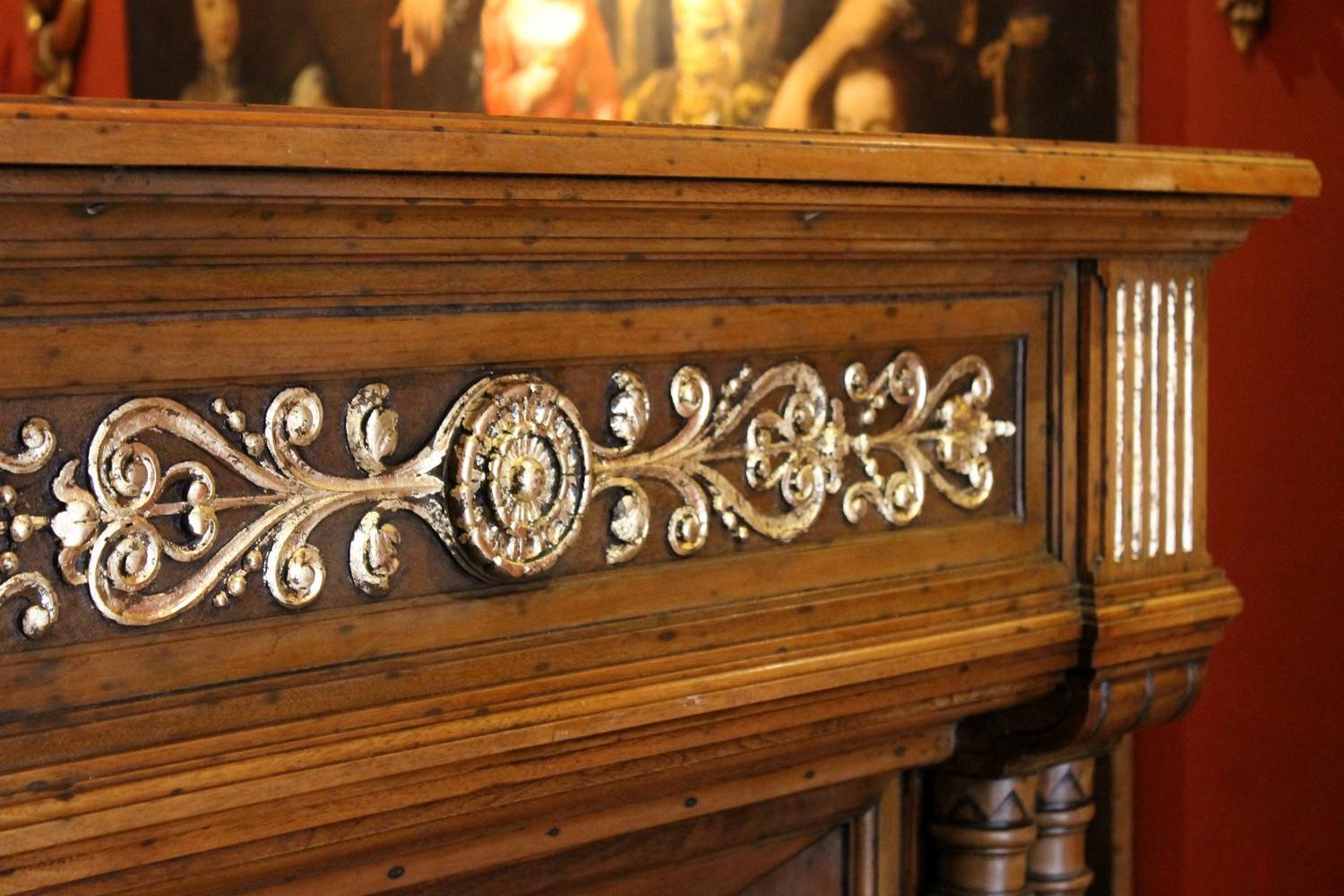 Italian Gothic Revival Carved Walnut Wood and Parcel Gilt Chimney Fireplace Mantlepiece