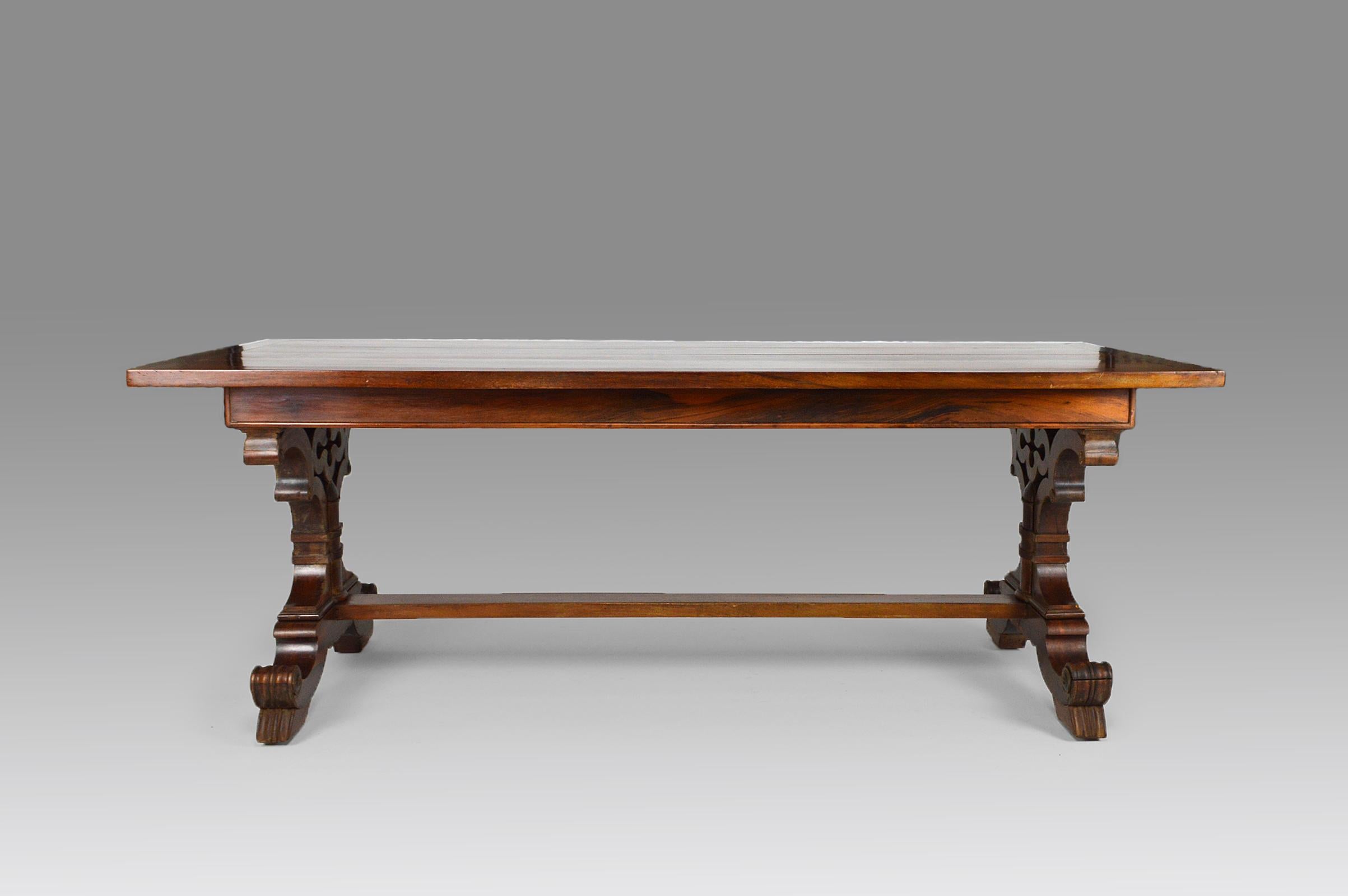 Large table with rectangular top, that can be used for a dining room, office, reception or conference room. In solid mahogany with carved and openwork base.

Neo-Gothic / Gothic Revival style, United Kingdom / England, Victorian Era, circa 1840.

In