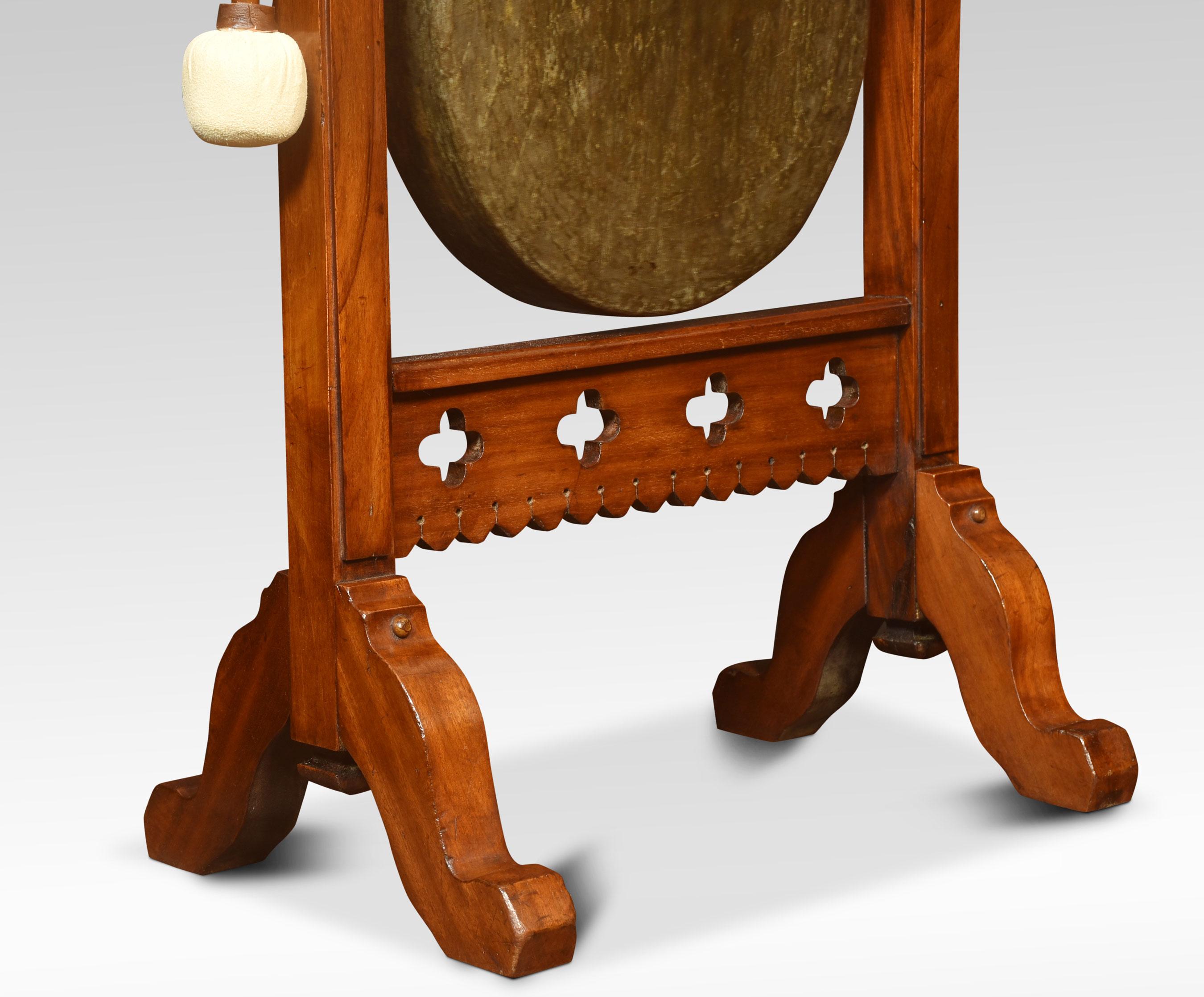 Gothic revival dinner gong, the carved walnut frame supporting the original brass gong. Together with beater.
Dimensions
Height 37.5 inches
Width 22 inches
Depth 14 inches.