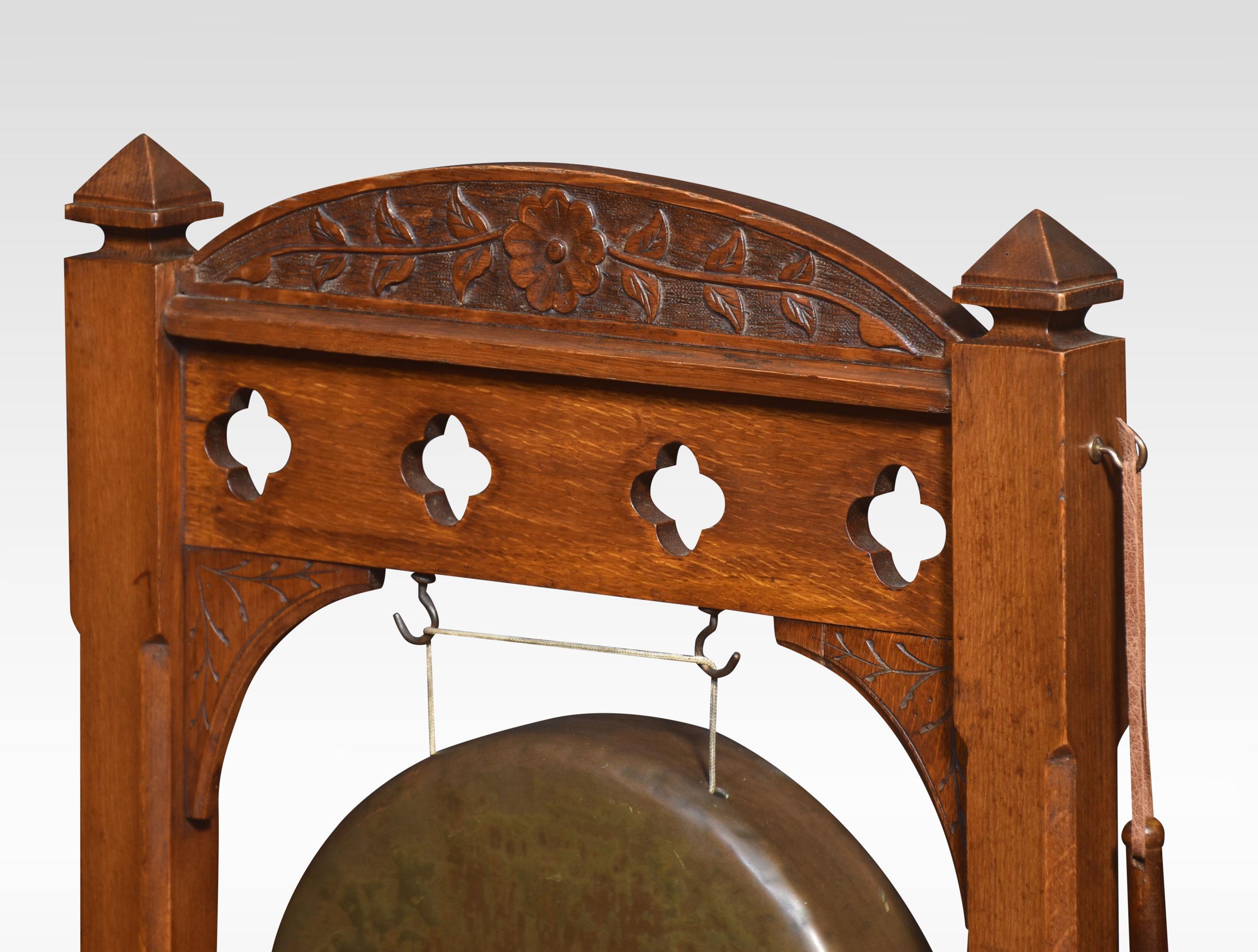 Gothic revival dinner gong, the carved walnut frame supporting the original brass gong. Together with beater.
Dimensions
Height 39.5 Inches
Width 24 Inches
Depth 15 Inches