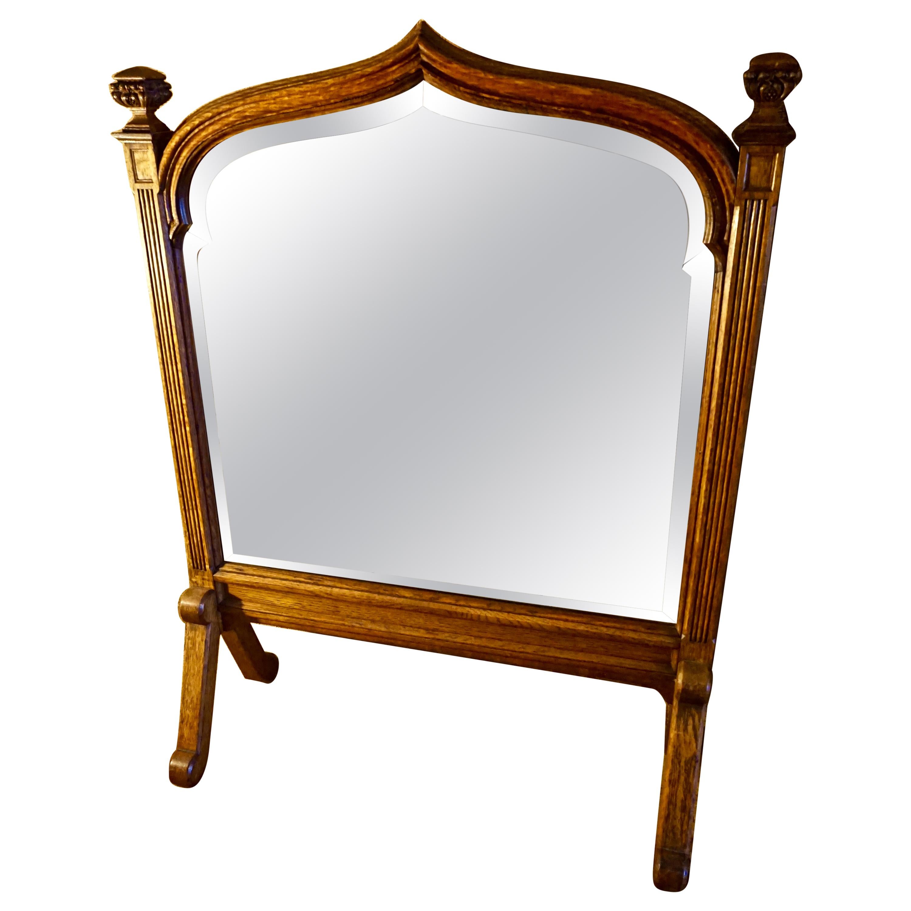 Gothic Revival English Oak Bevel Shield Shape Stand Mirror with Finials For Sale