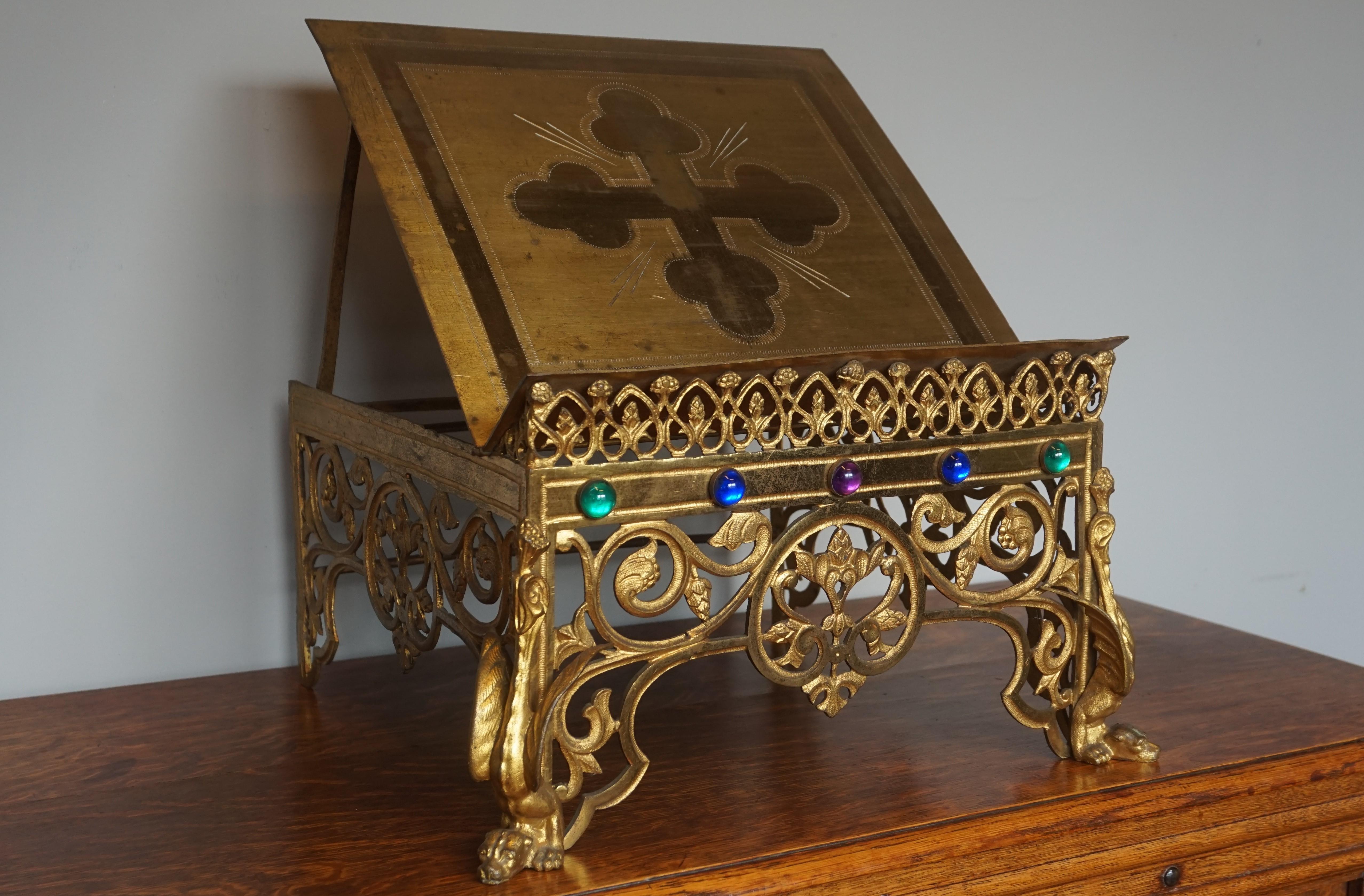 Stunning and sculptural 19th century church bible stand.

This late 1800s gilt bible stand has beautiful details and it is in remarkably good condition. The stunning design with the detailed and gilt scrolling leafs and fruits on both the front and