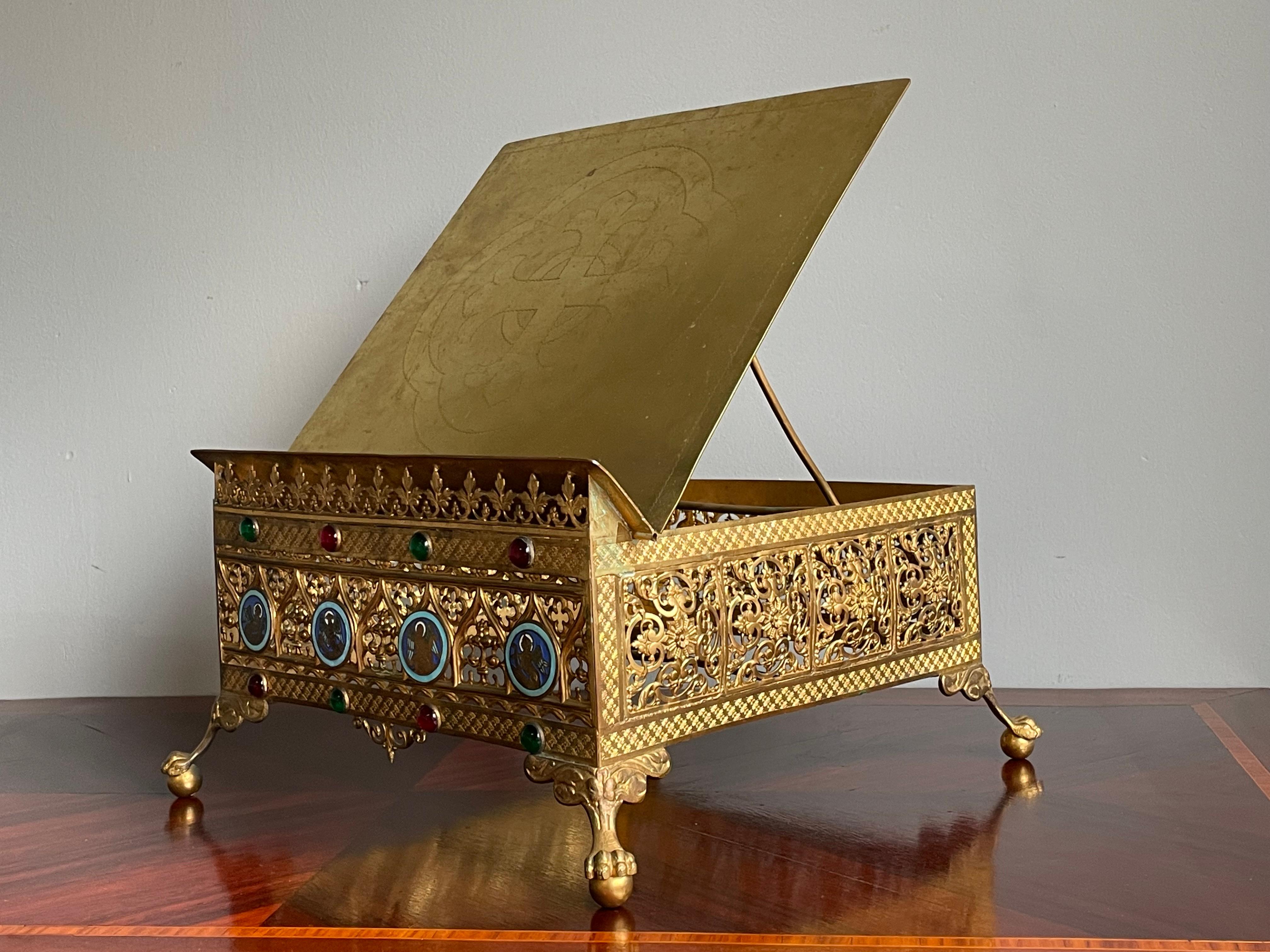 Stunning 19th century Gothic church bible stand with evangelist cloisonné symbols.

This rare, late 1800s, gilt bronze bible stand has beautiful details and it is in remarkably good condition. The stunning design with the detailed and gilt Gothic