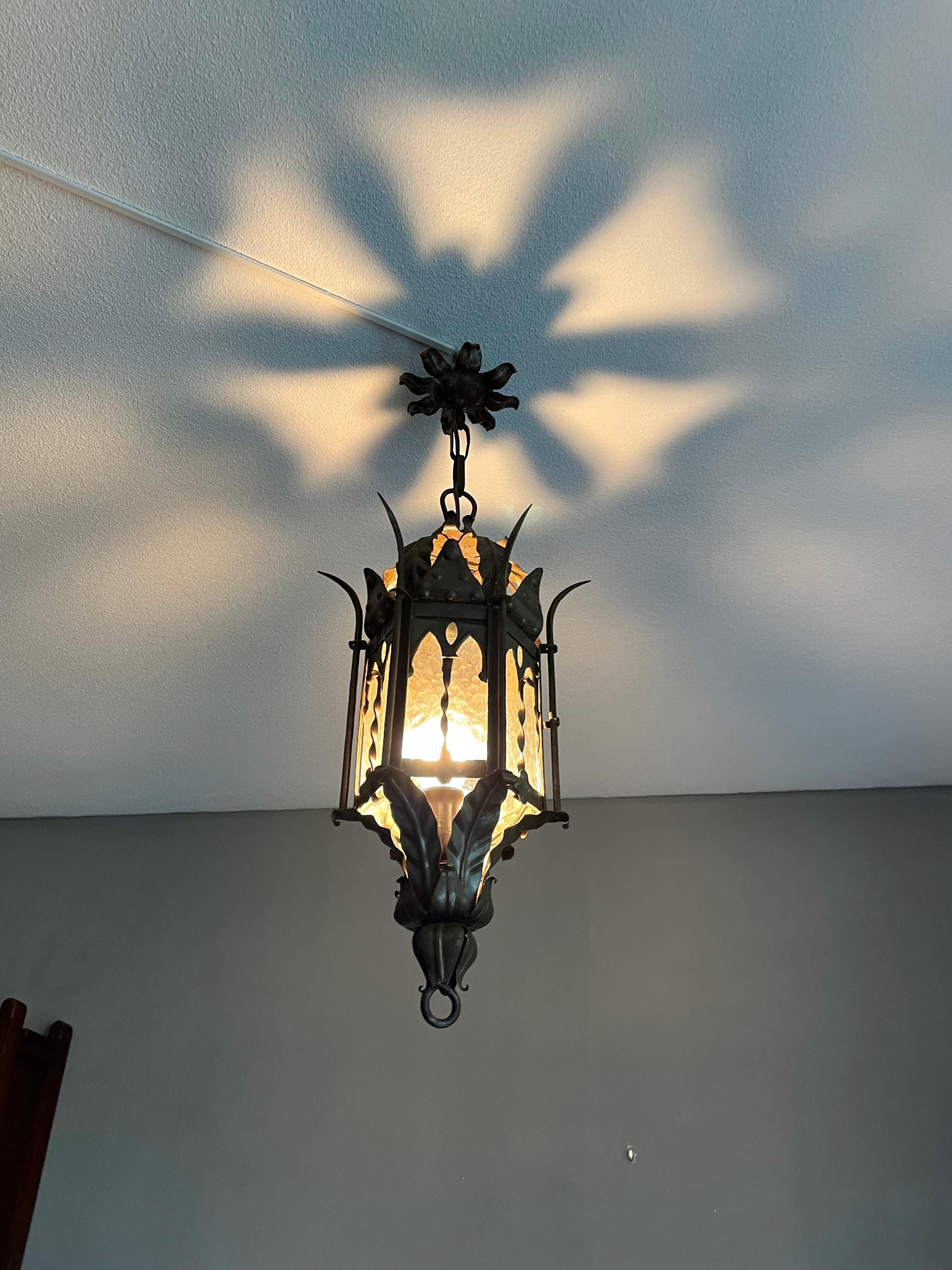 All handcrafted, hexagonal Gothic light fixture.

If you are a collector of rare and ancient looking Gothic antiques then this good size and possibly one of a kind pendant could be flying your way soon. With antique light fixtures as one of our
