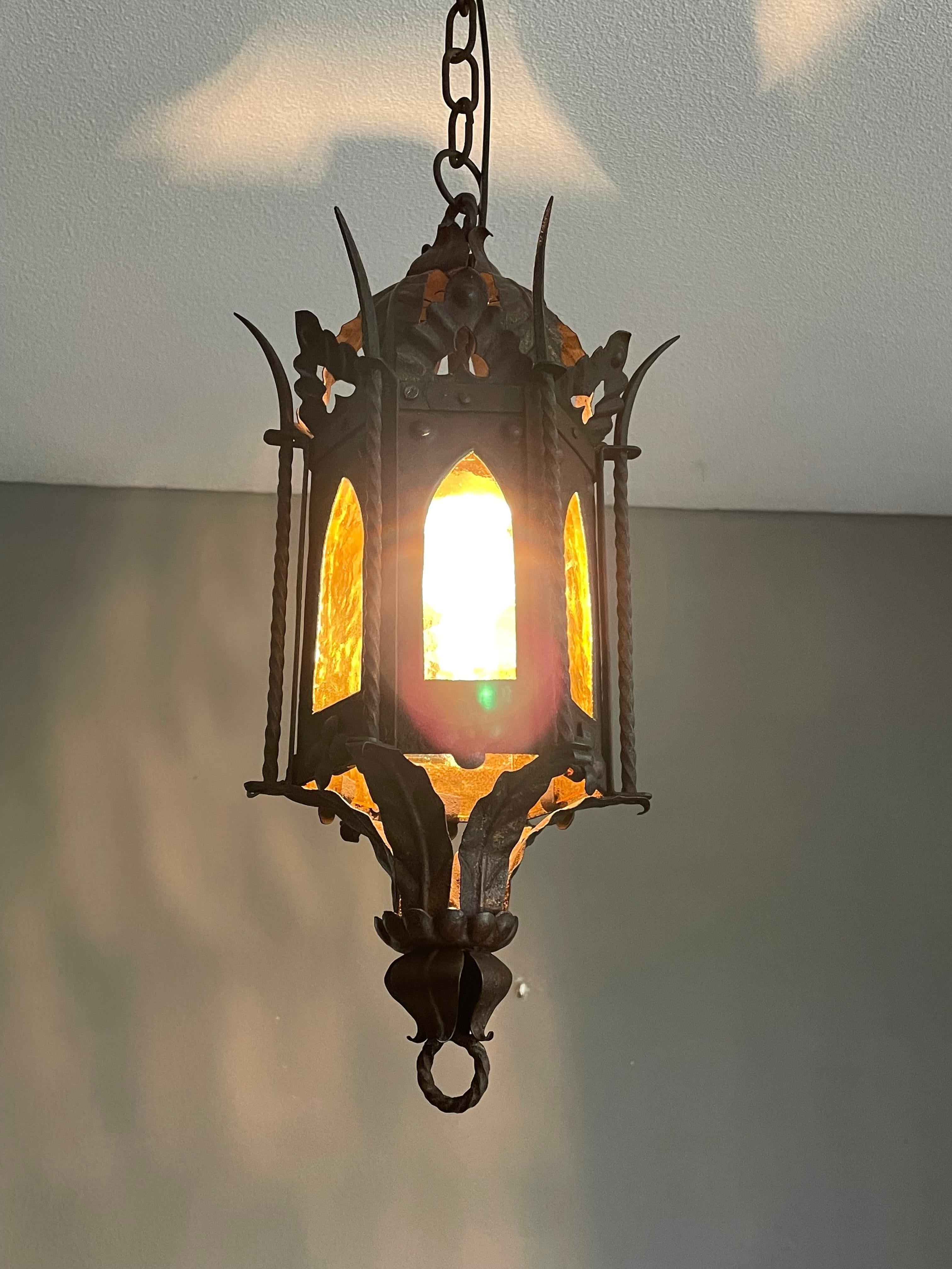 All handcrafted, hexagonal Gothic light fixture.

If you are a collector of rare and ancient looking Gothic antiques then this relatively small size and possibly one of a kind pendant could be flying your way soon. With antique light fixtures as