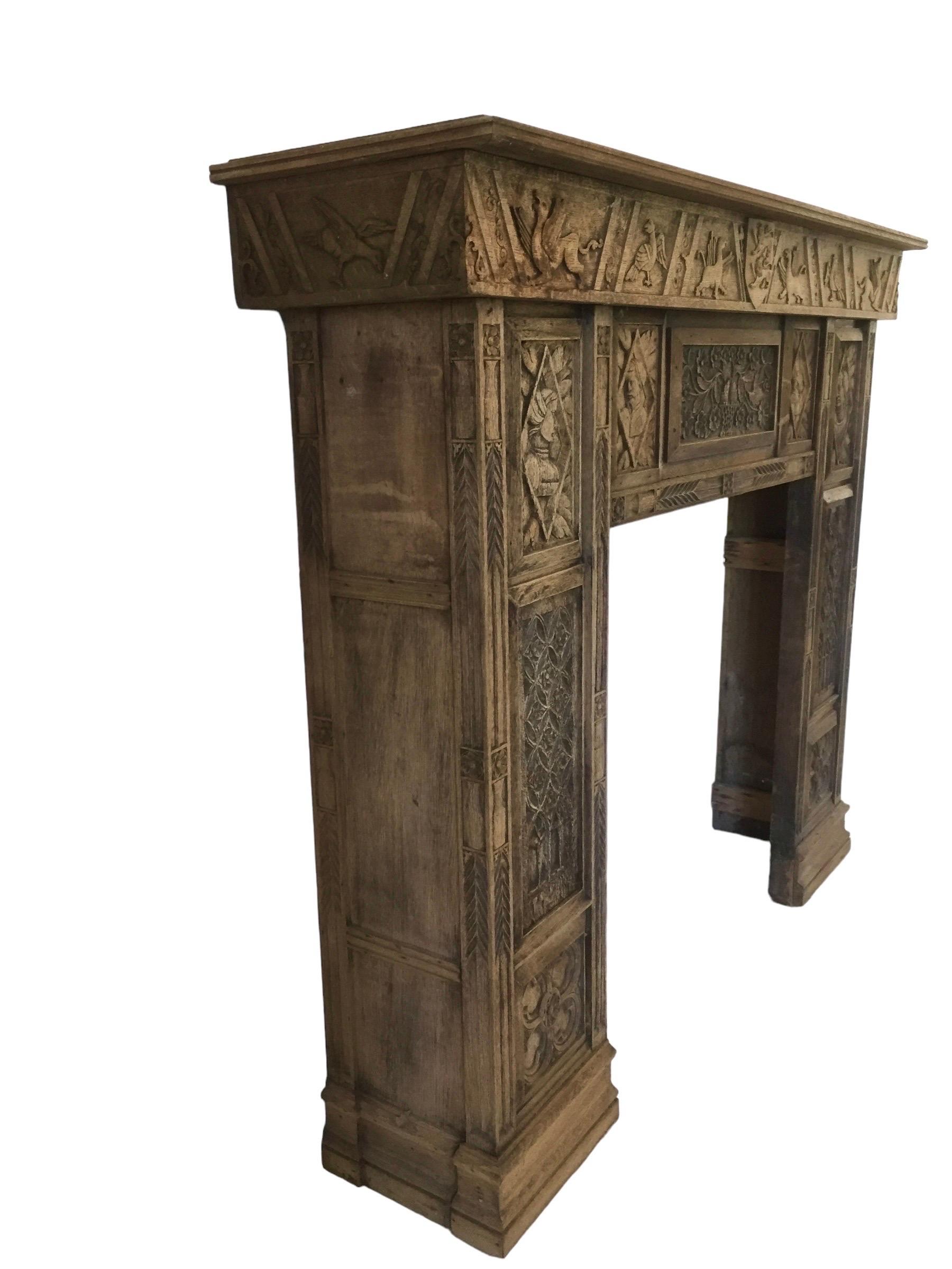 Magnificent neo-Gothic / Gothic Revival fireplace in richly carved oak wood from France 19th century.
This wonderful 19th century fireplace was made with some 15th and 16th century panels. It therefore has notable historical interest. The