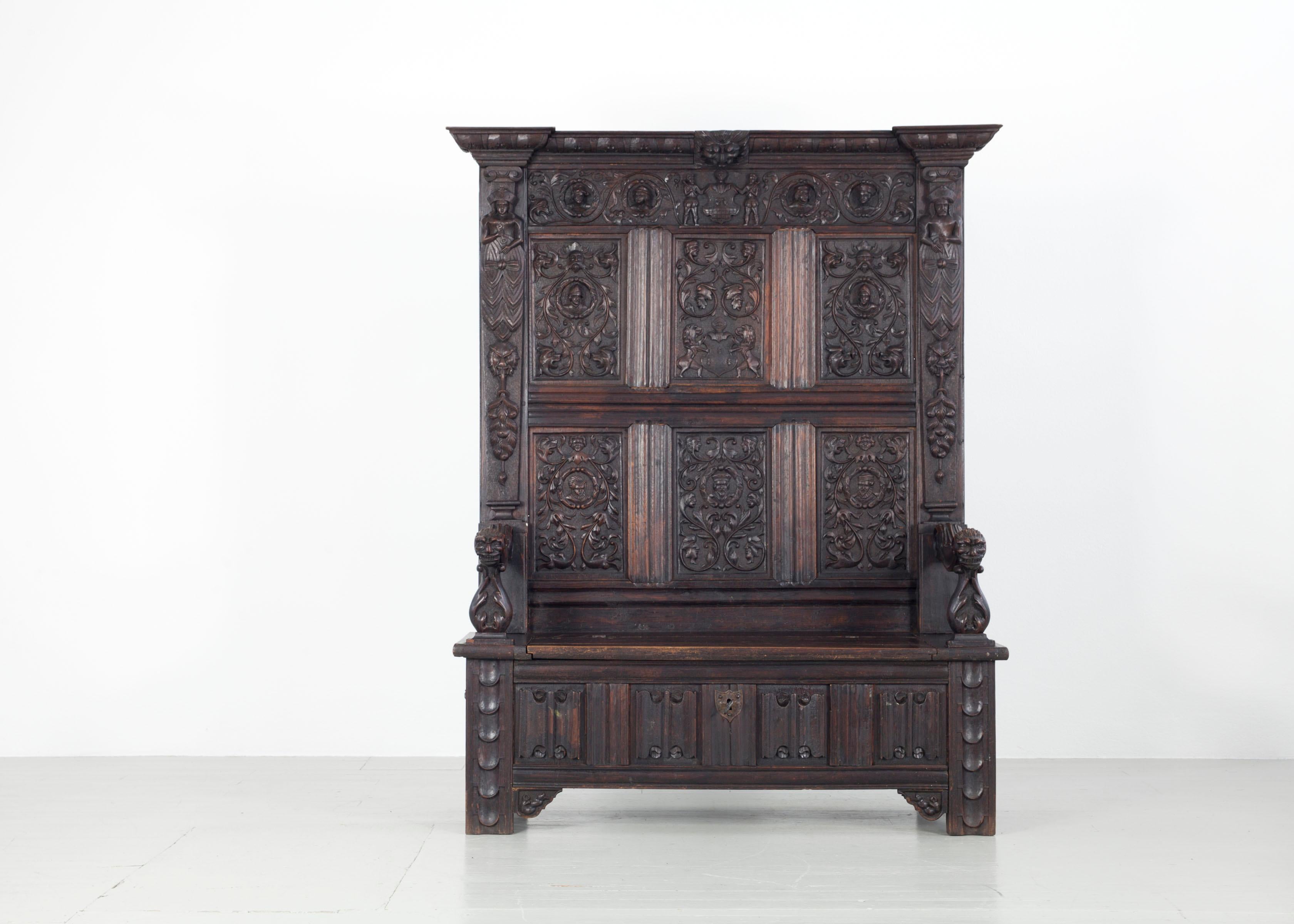 Gothic-Revival oak chest bench with carved figures and details. Germany, circa 1900.
Storage space under the bench.