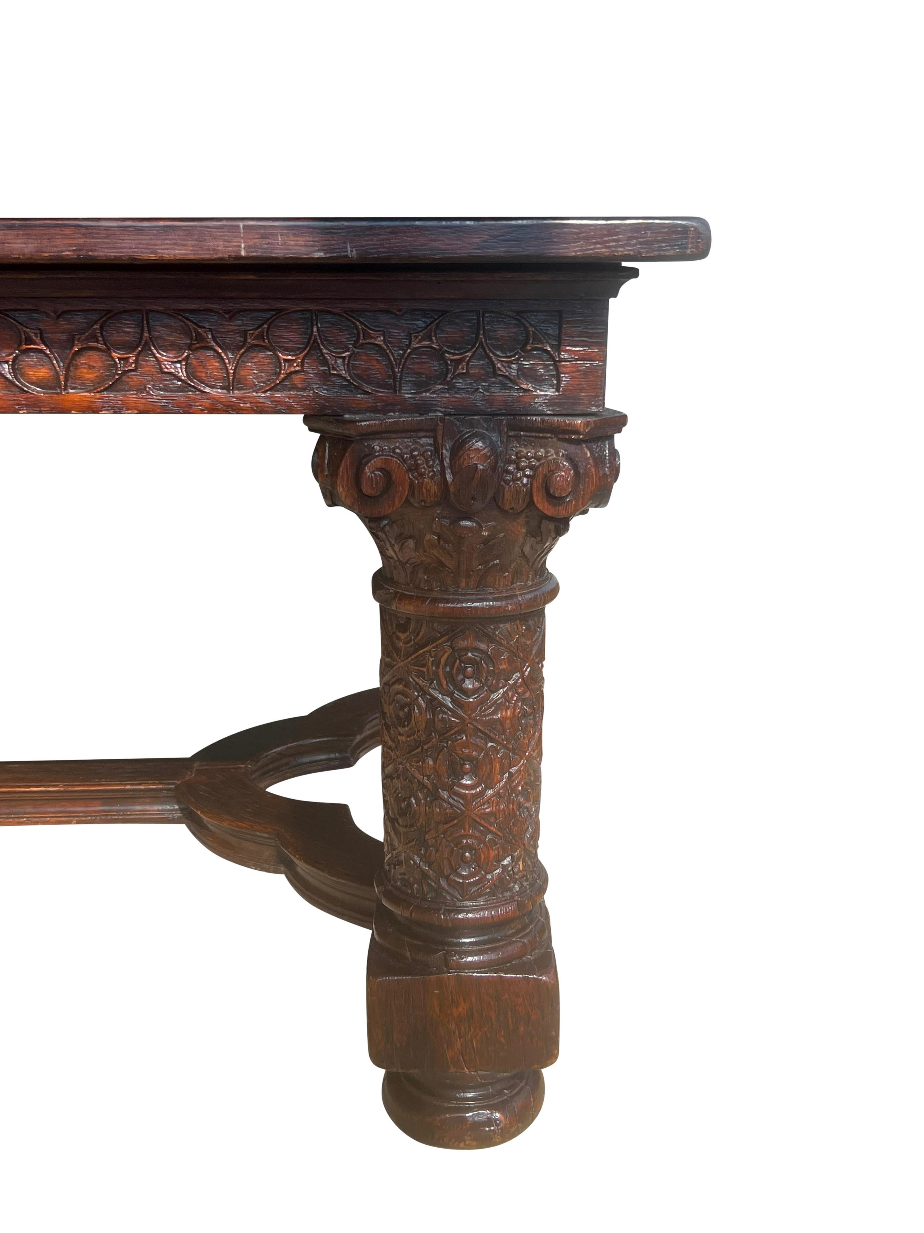 Late 19th Century Gothic Revival Oak Draw Leaf Dining Table For Sale