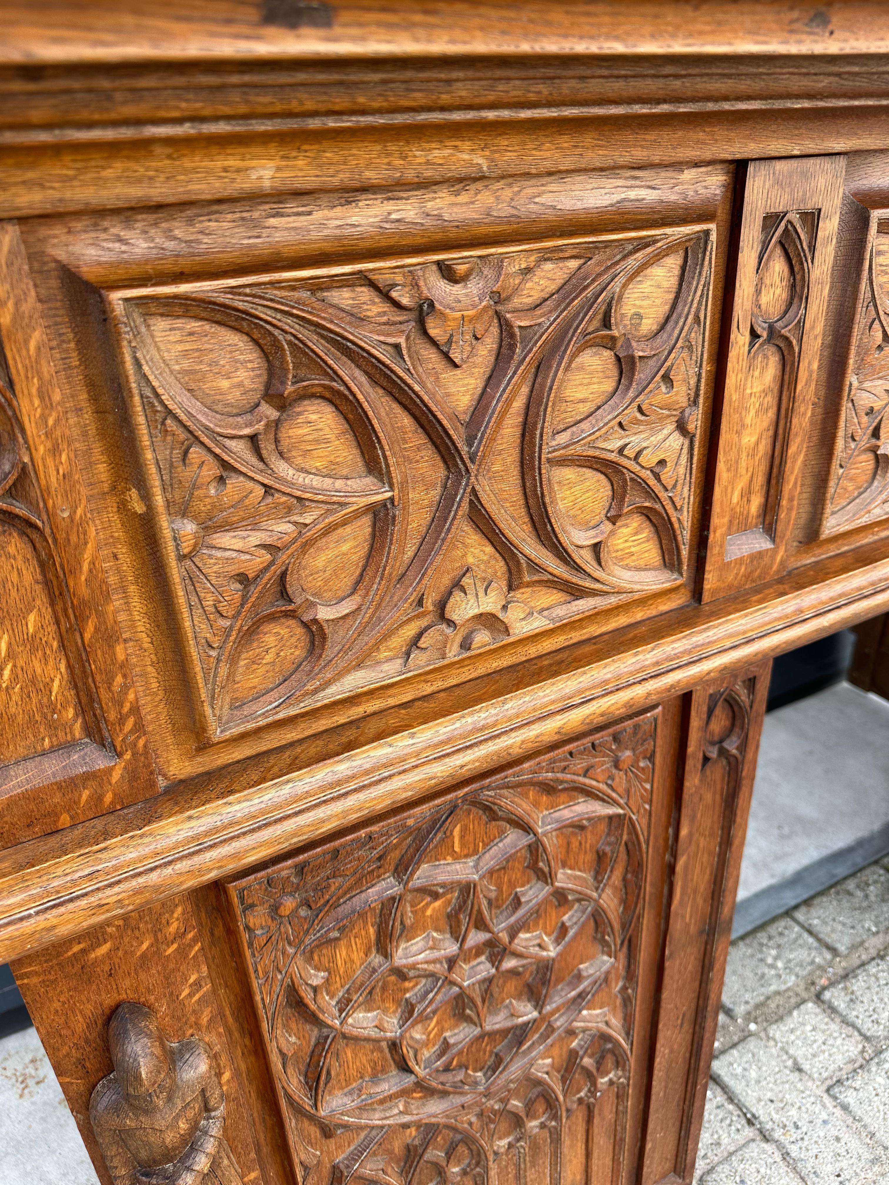 20th Century Gothic Revival Oak Fireplace Mantel with Carved Church Window Panels & Guards For Sale