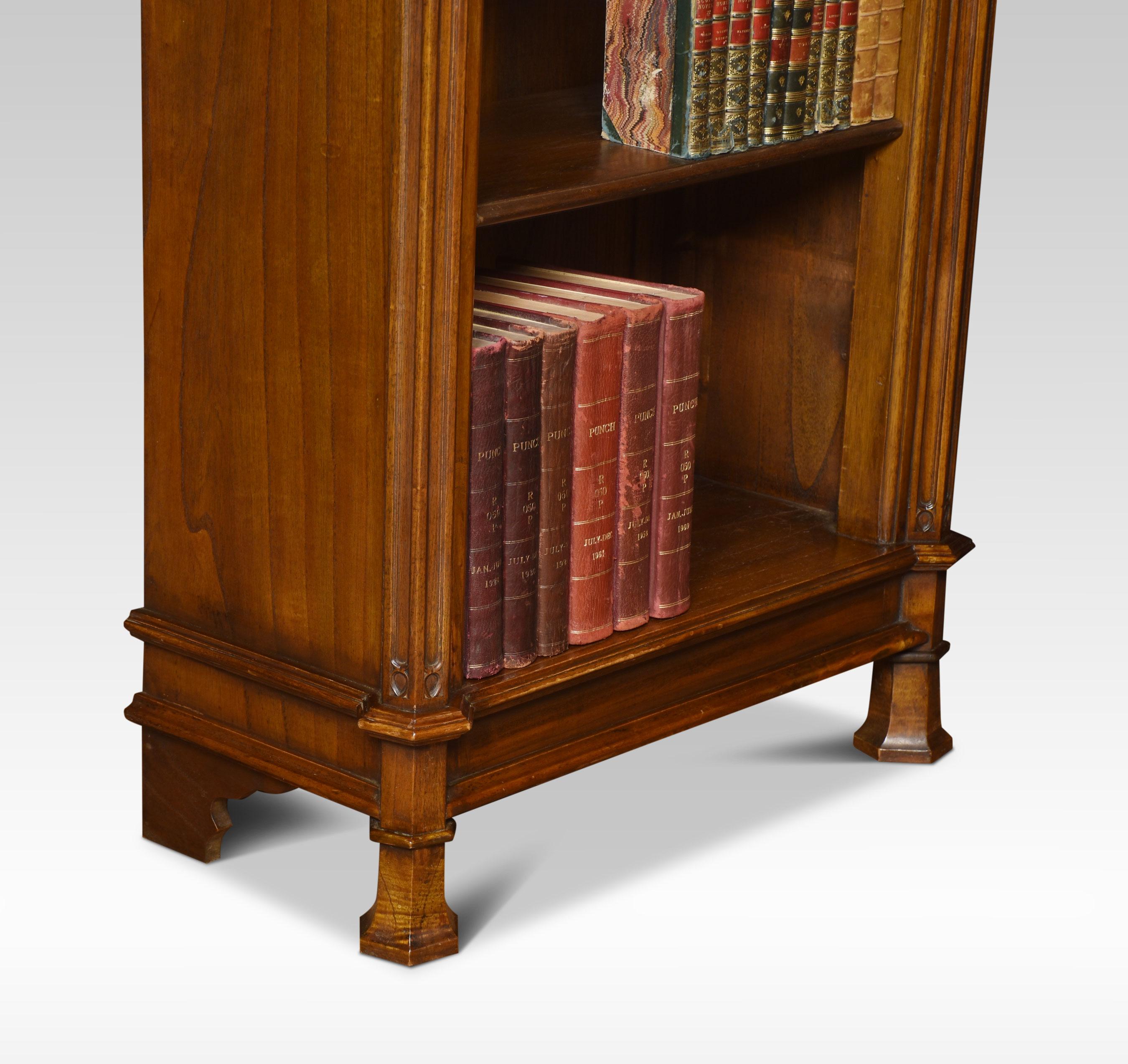 Gothic revival oak open bookcase, the architectural pediment above adjustable shelved interior, flanked by moulded columns. All raised up on stylised feet.
Dimensions
Height 82 inches
Width 28 inches
Depth 15.5 inches.