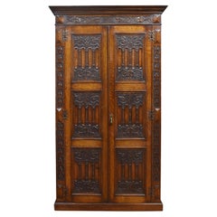 Vintage Gothic revival oak wardrobe