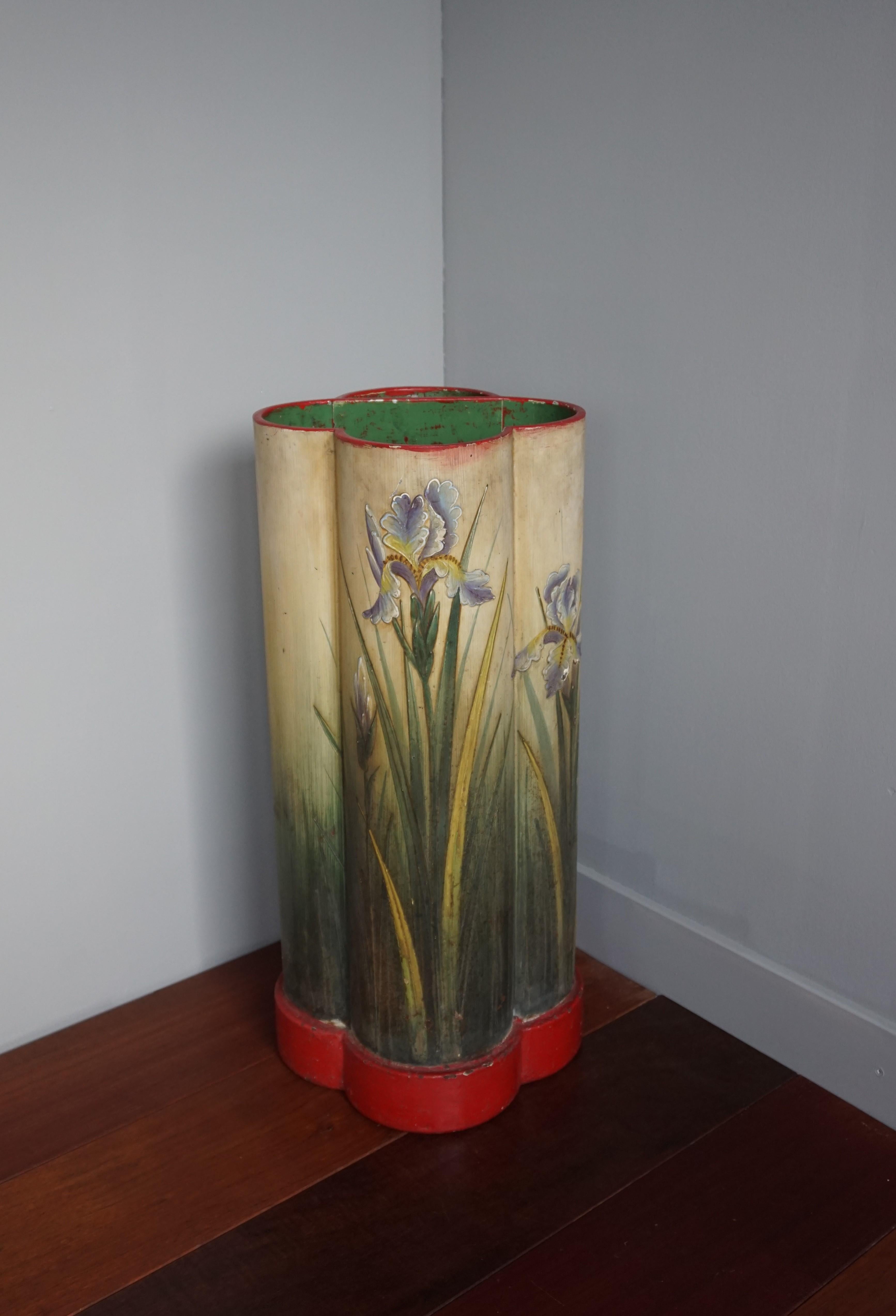 A fine work of Gothic Art depicting iris flowers, associated with the Passion of Christ and the Resurrection.

This Gothic quatrefoil design umbrella stand is another one of our recent, unique finds. All handmade around 1900-1915 this weighty and