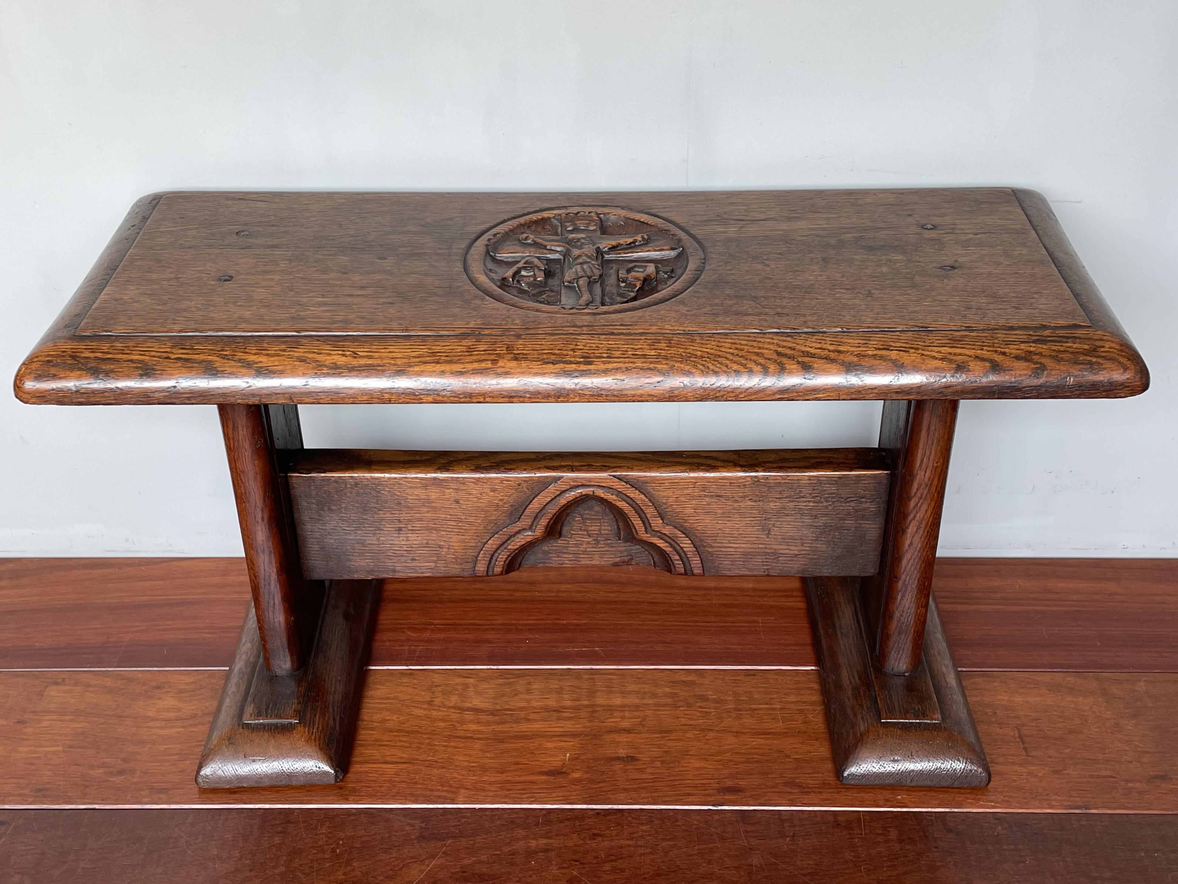 One of a kind Gothic bench with deeply carved crucifix sculpture with A(lpha) and O(mega) letters.

This striking, antique Gothic bench comes with a unique crucifix sculpture in the center with the Christian symbol for Alpha and Omega. In all our
