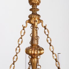 Gothic Revival Style Brass Eight Light Chandelier With Candle Style Bulb Sockets