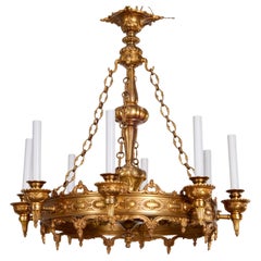 Vintage Gothic Revival Style Brass Eight Light Chandelier With Candle Style Bulb Sockets